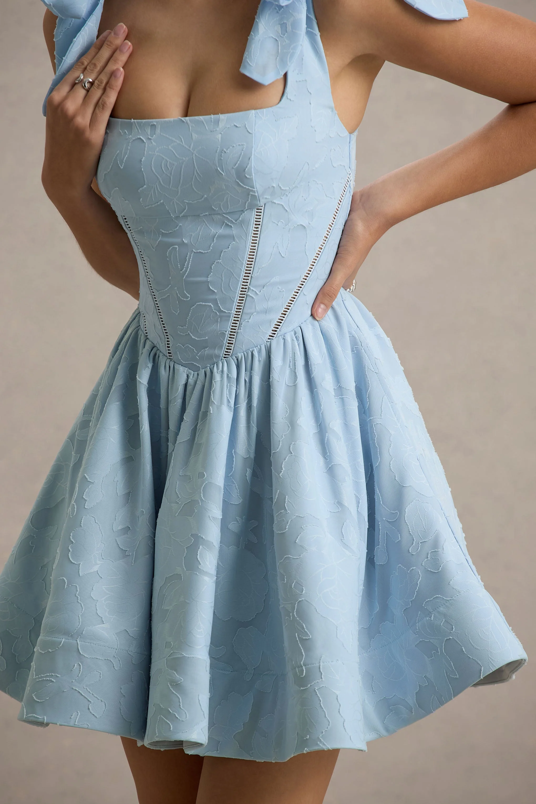 10860-bethani-light-blue-skater-mini-dress-with-bow-straps-1.webp