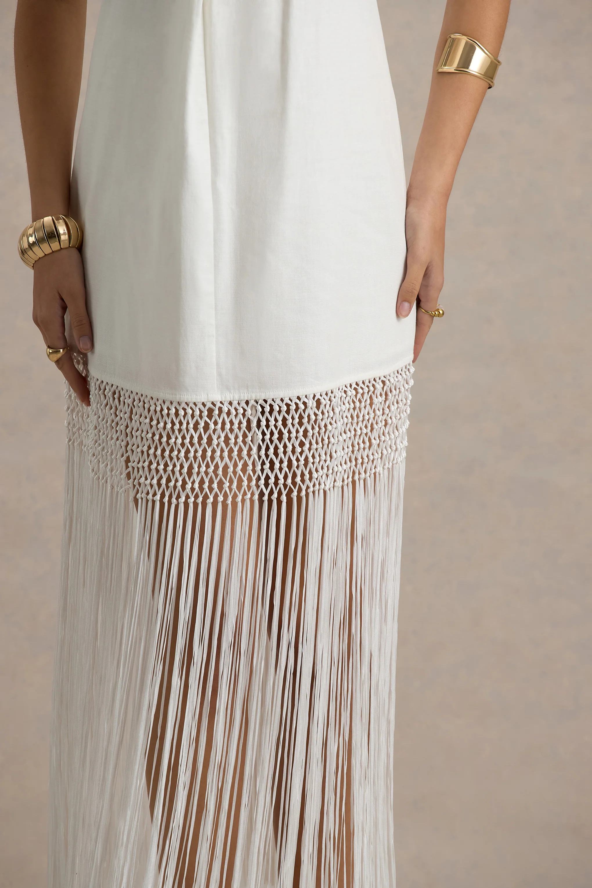10961-fiametta-ecru-linen-halter-neck-fringe-maxi-dress-1.webp