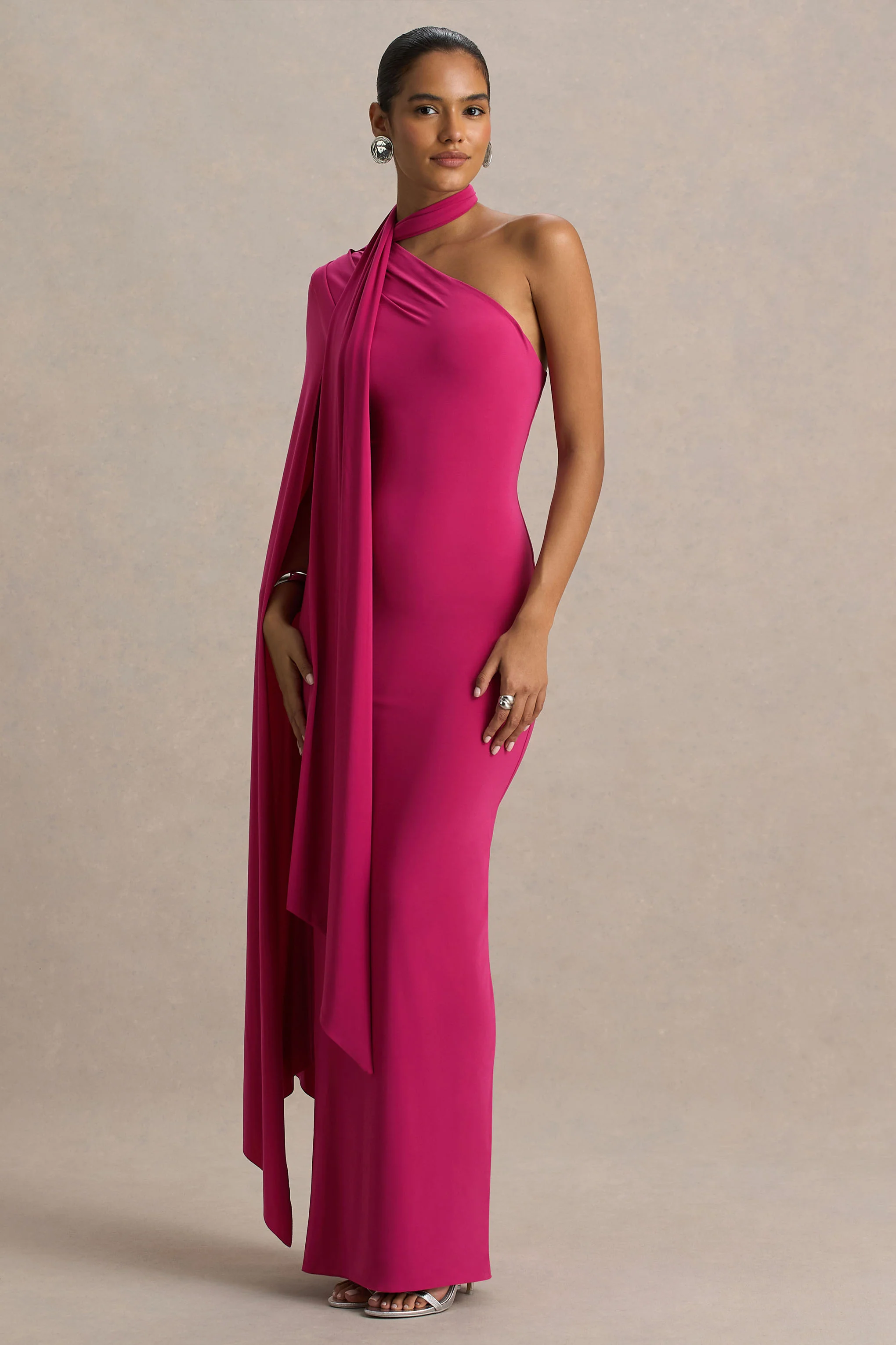 12187-amal-hot-pink-asymmetric-neck-maxi-dress-with-scarf-and-cape-detail-1.webp