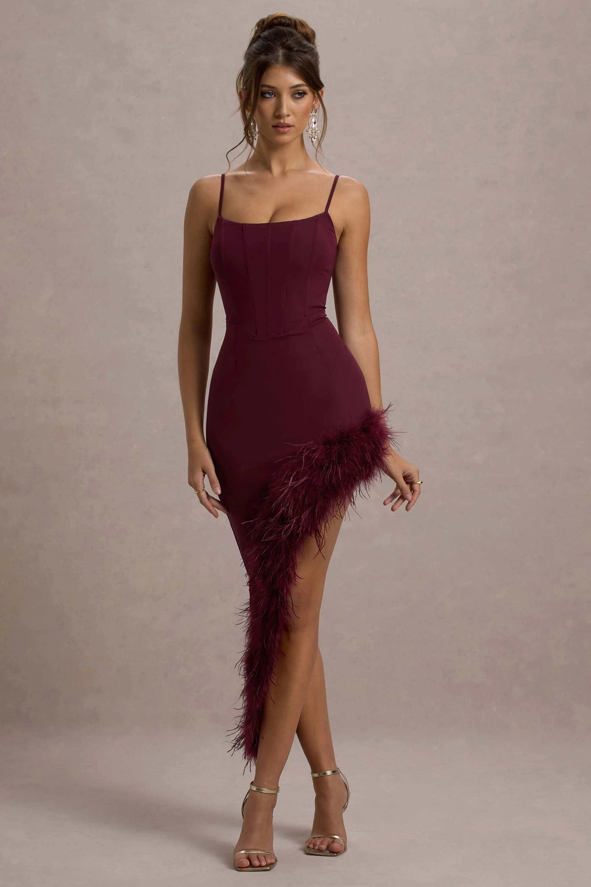 1245-high-status-burgundy-strappy-corset-asymmetric-maxi-dress-with-feather-trim-1.webp