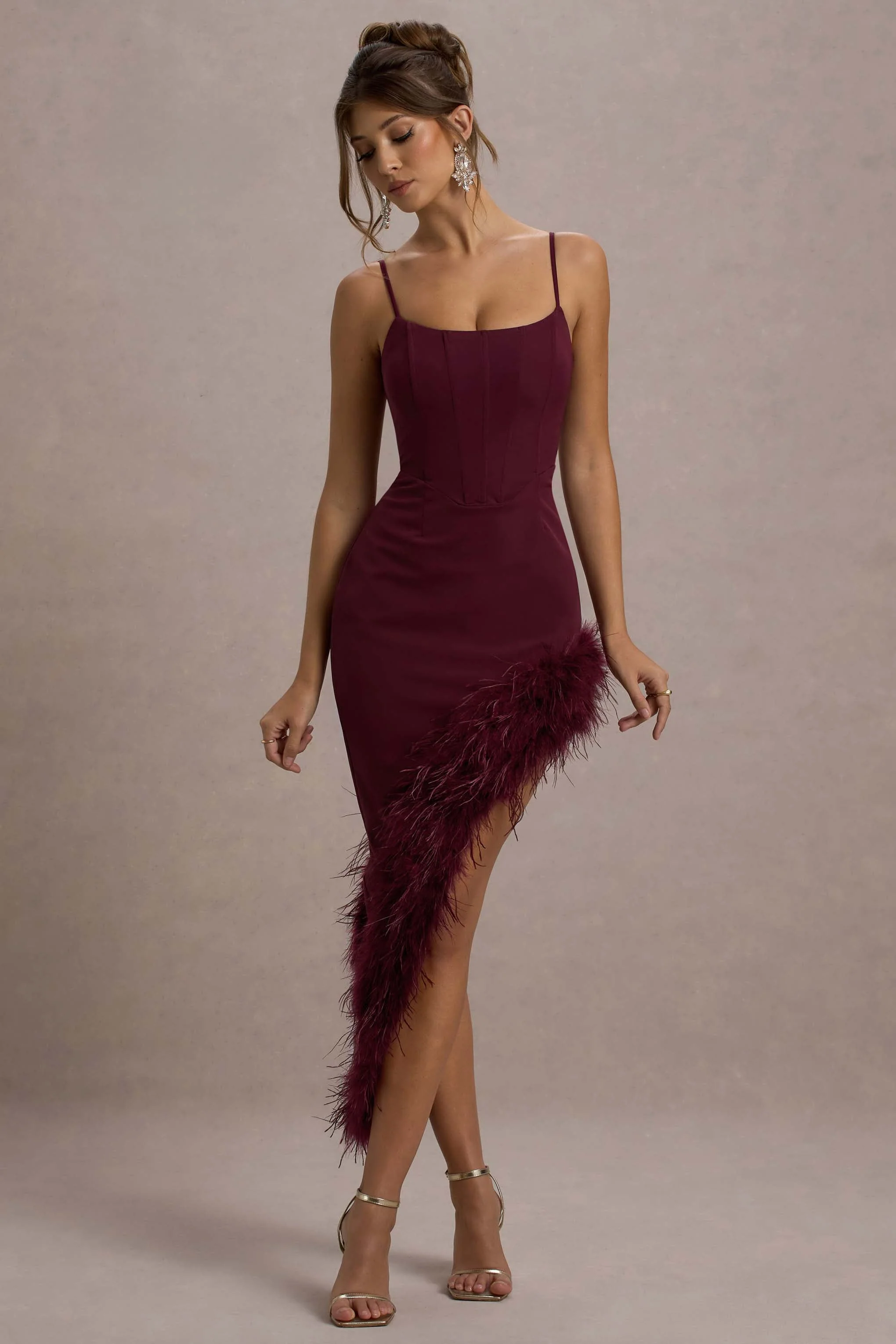 1245-high-status-burgundy-strappy-corset-asymmetric-maxi-dress-with-feather-trim-1.webp