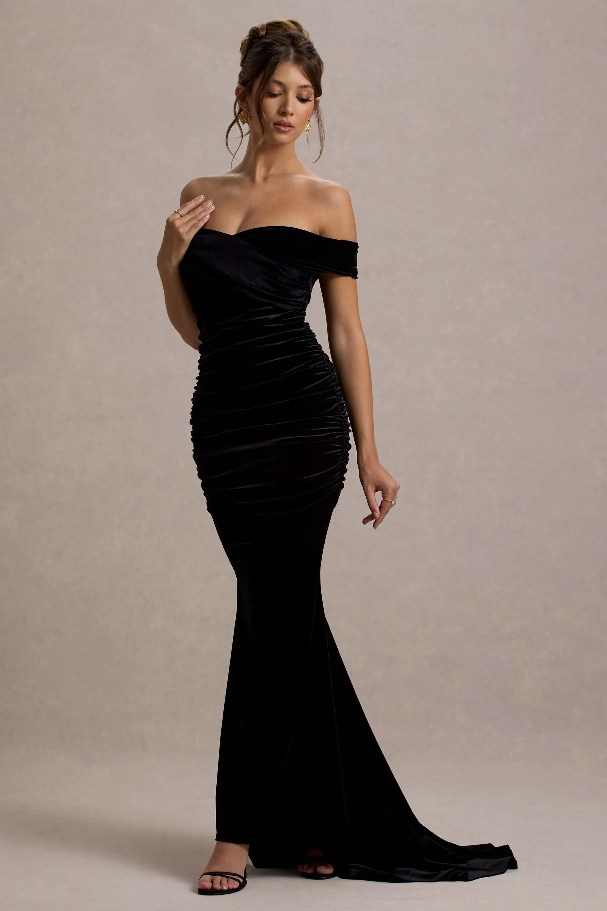 1266-apolline-black-velvet-off-the-shoulder-ruched-fishtail-maxi-dress-1.webp