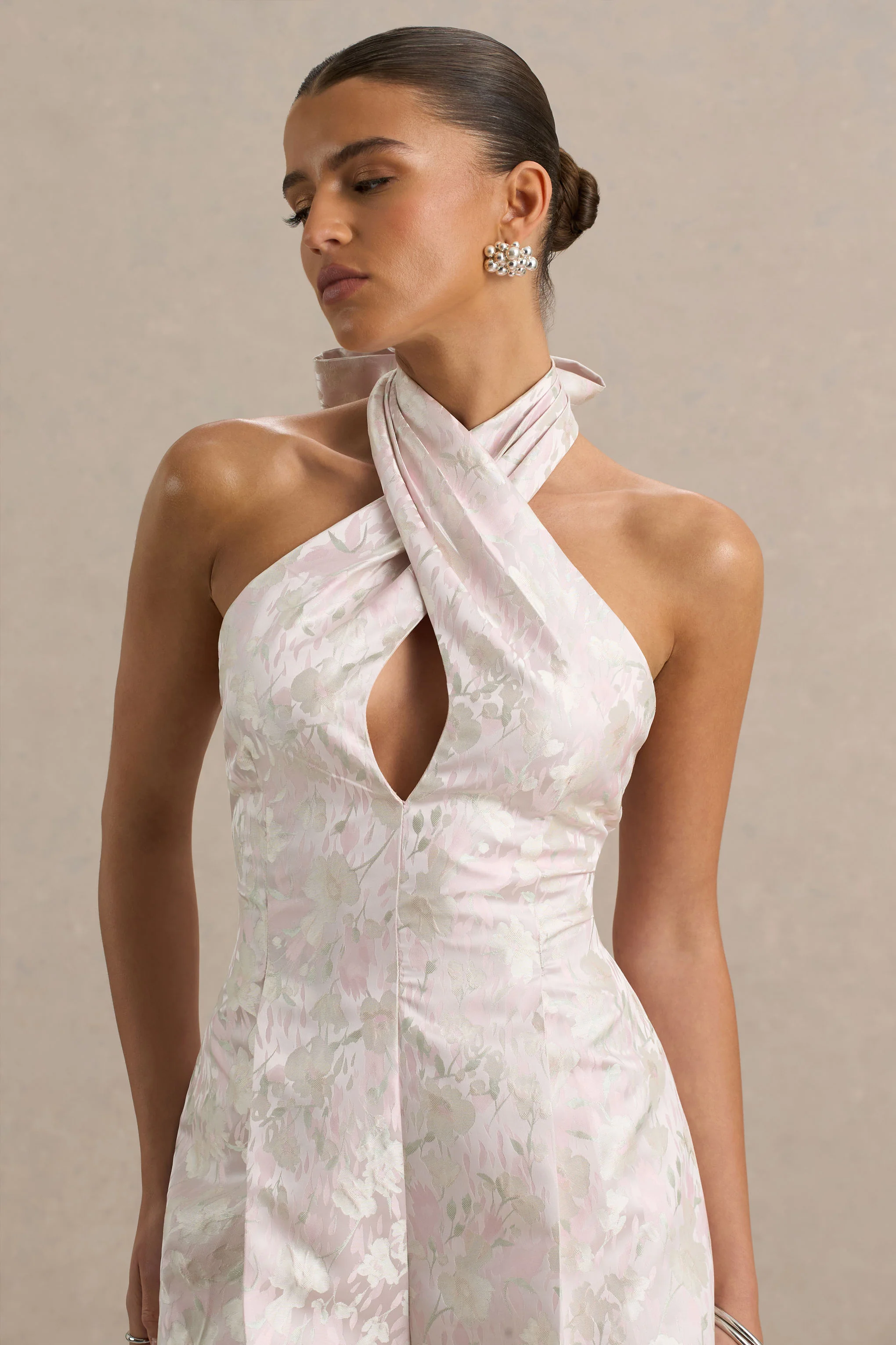 12891-sharie-cream-floral-print-jacquard-halter-neck-playsuit-with-cut-out-detail-1.webp