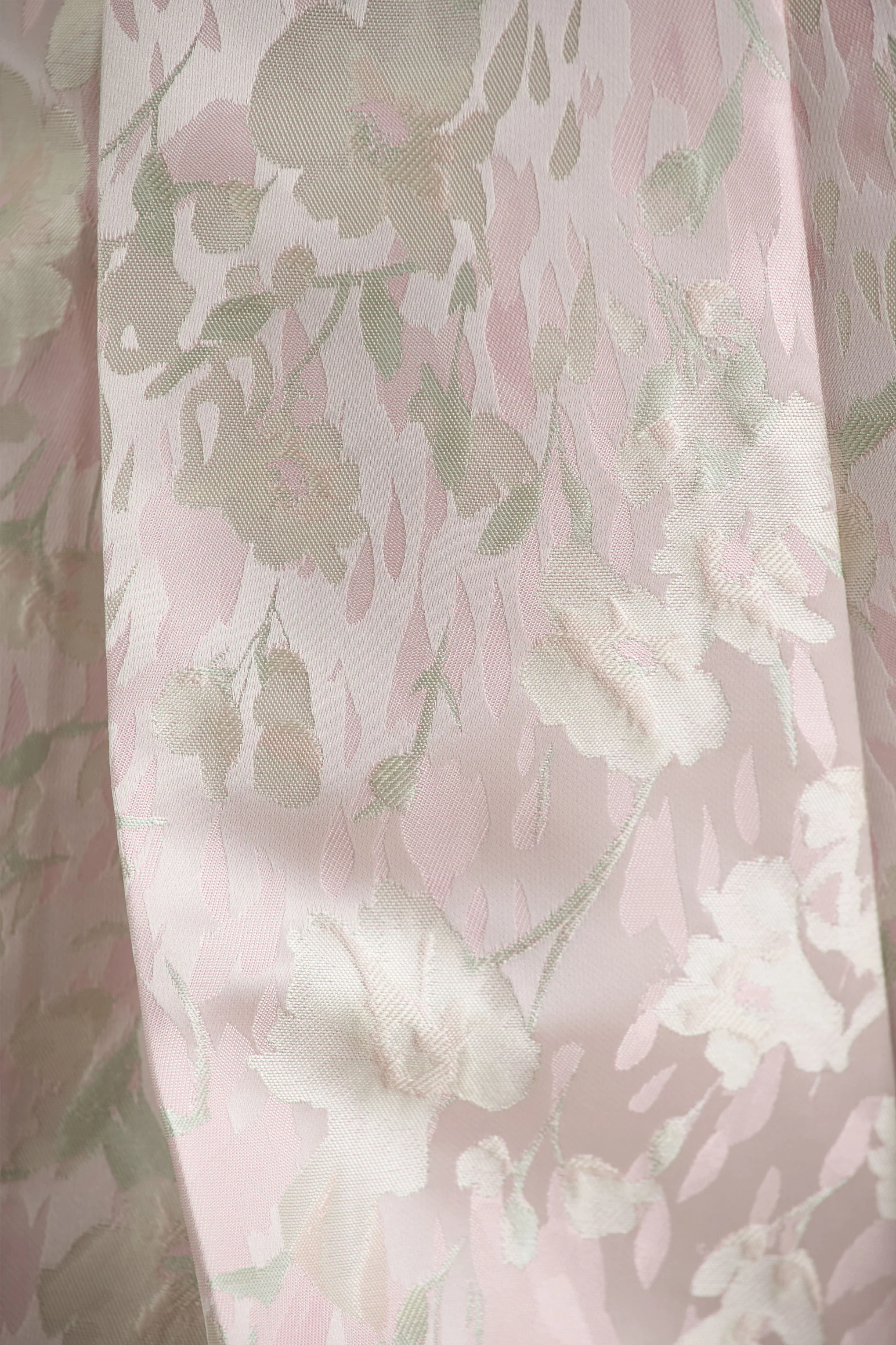 12891-sharie-cream-floral-print-jacquard-halter-neck-playsuit-with-cut-out-detail-1.webp