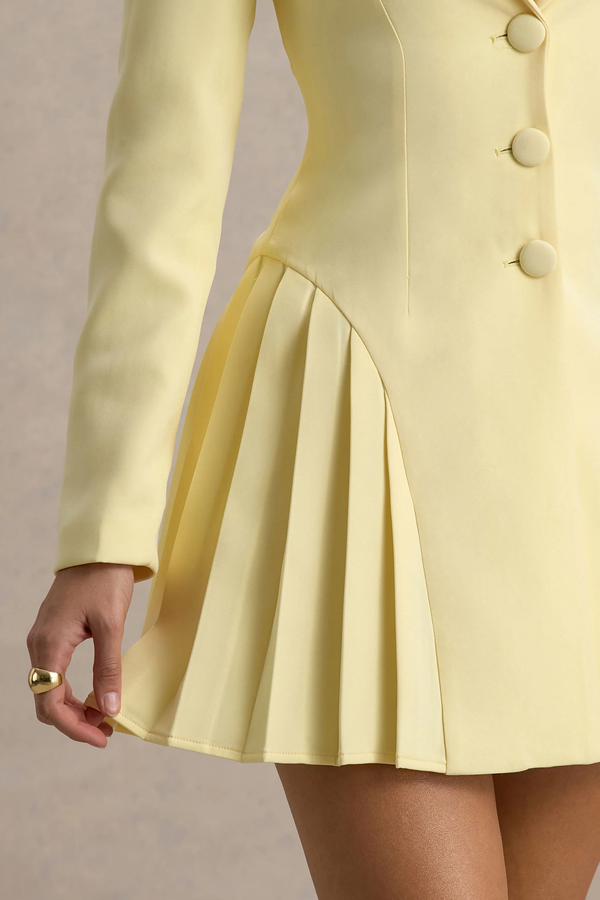 12930-blossoming-lemon-plunge-neck-tailored-mini-dress-with-pleating-1.webp