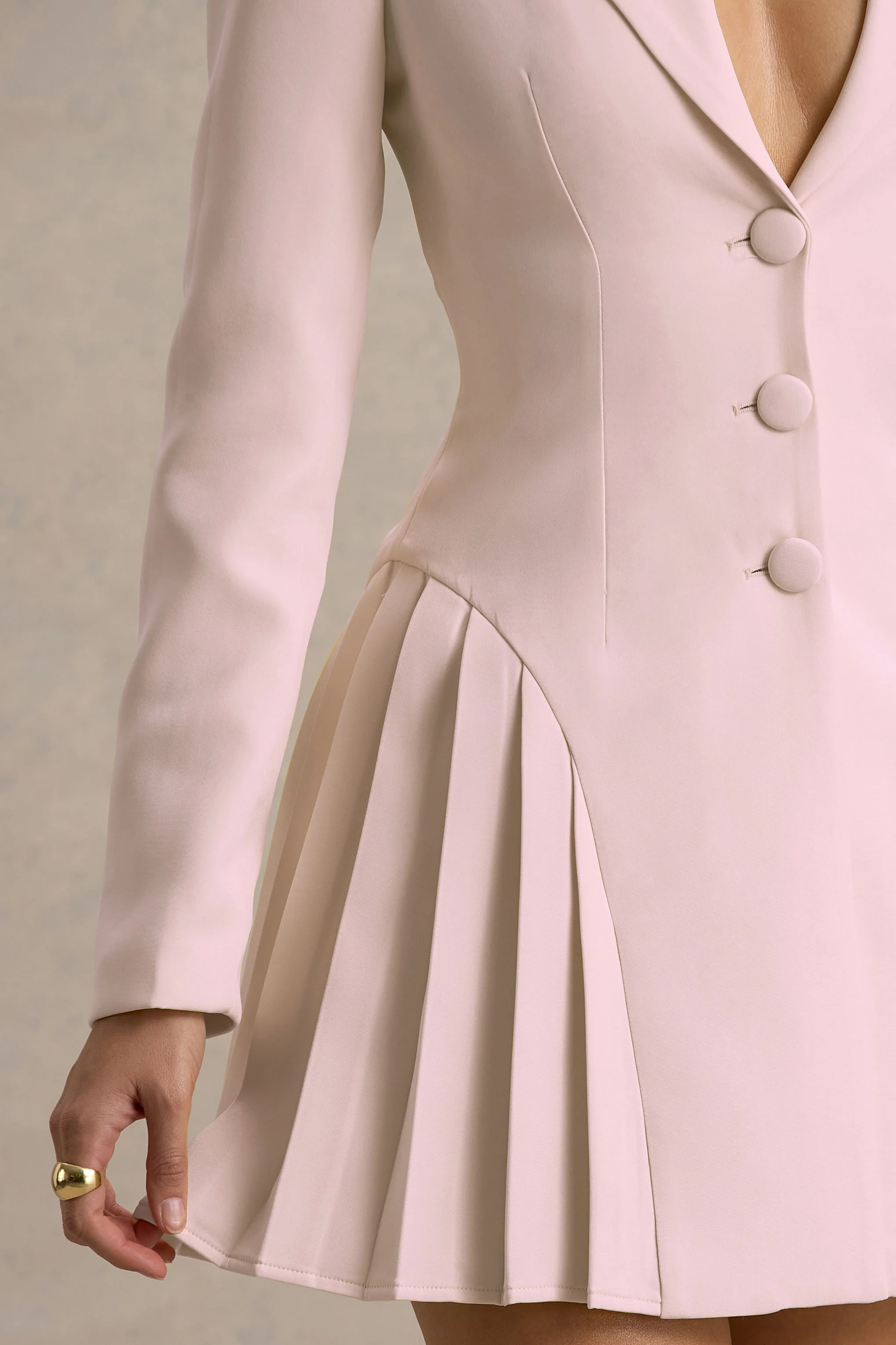 12937-blossoming-baby-pink-plunge-neck-tailored-mini-dress-with-pleating-1.webp