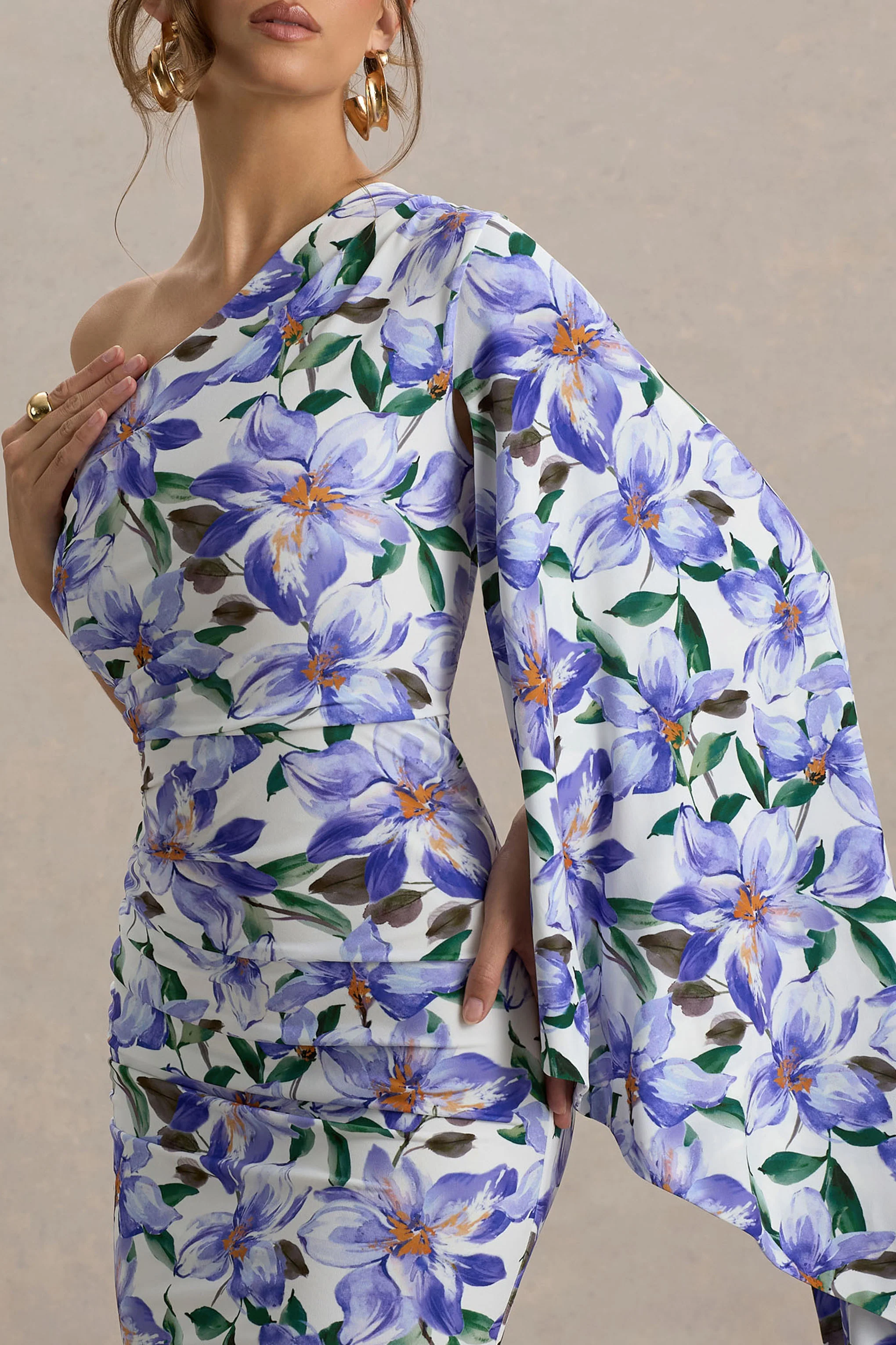 13111-clementina-purple-lily-print-asymmetric-cape-sleeve-maxi-dress-1.webp