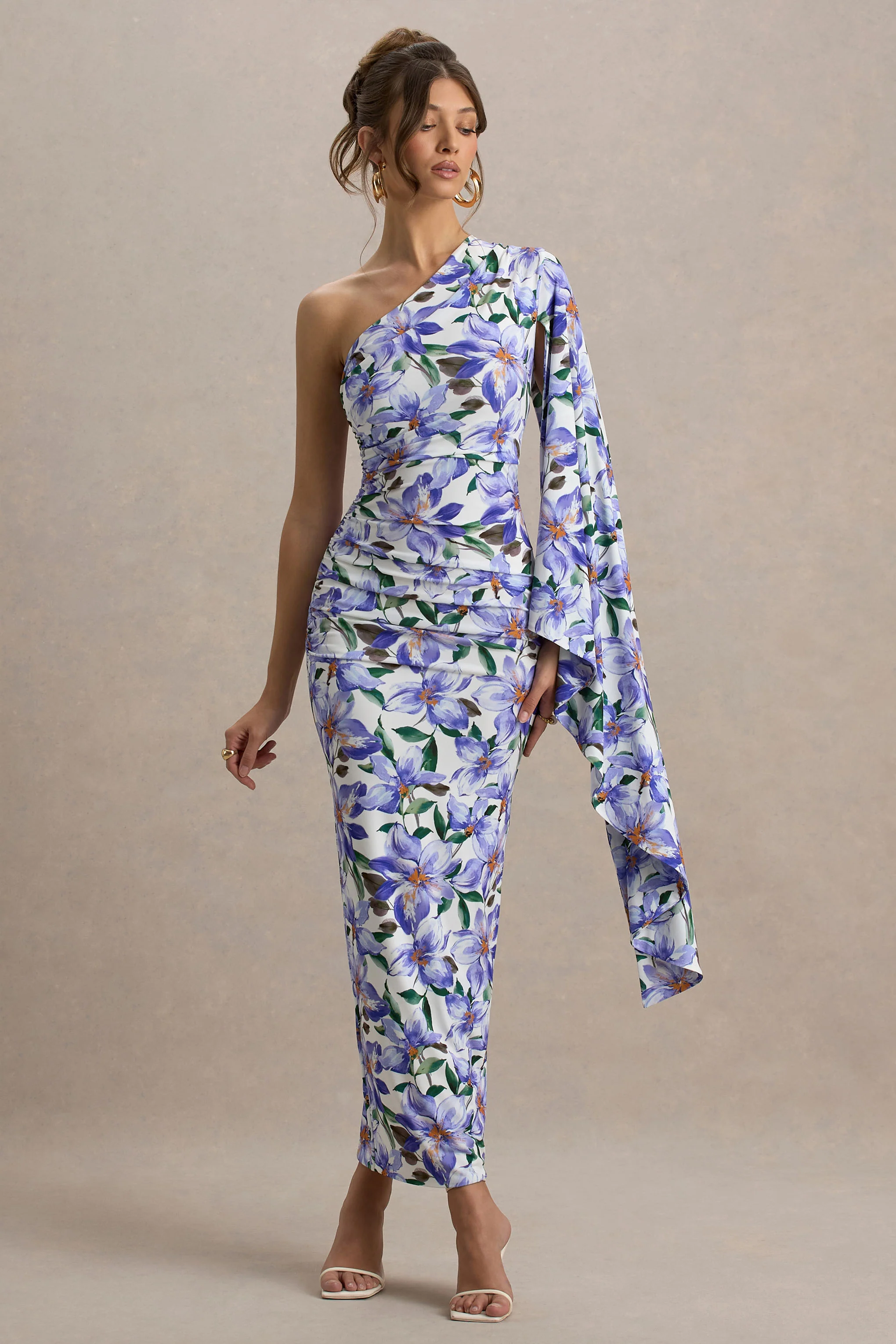 13111-clementina-purple-lily-print-asymmetric-cape-sleeve-maxi-dress-1.webp
