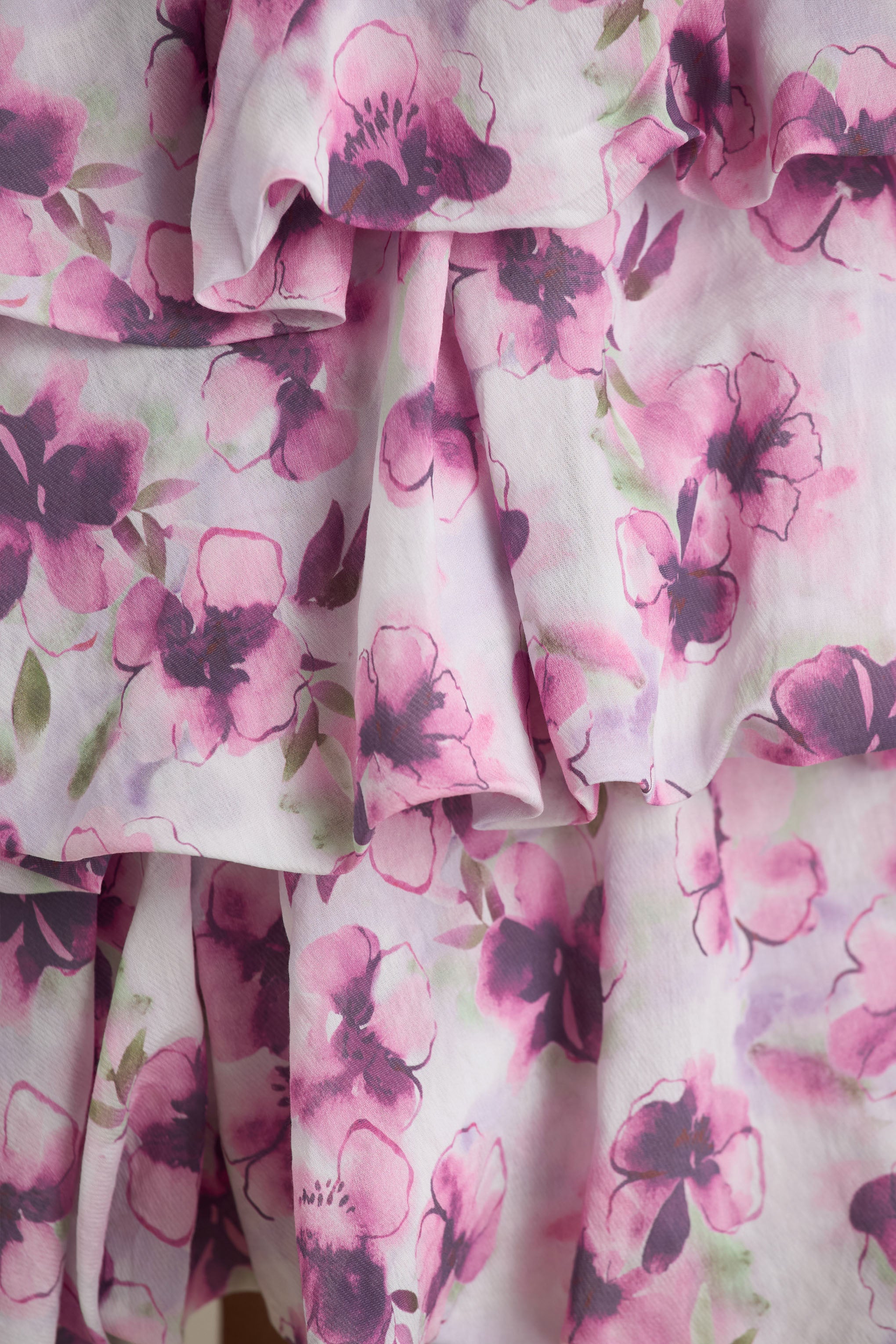 14028-swirl-cream-floral-print-bandeau-puffball-mini-dress-with-ruffle-detail-1.webp