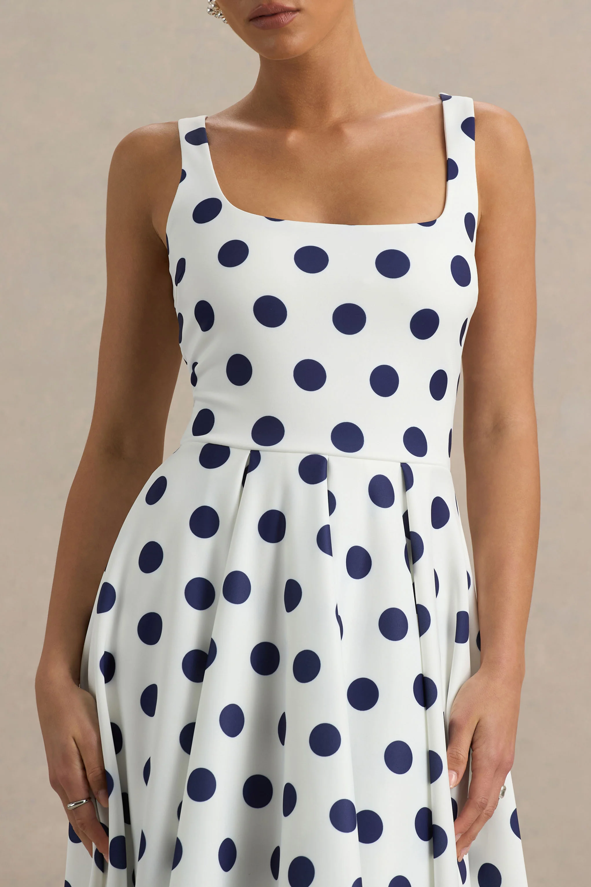 14184-berta-white-and-navy-polka-dot-square-neck-midi-dress-1.webp