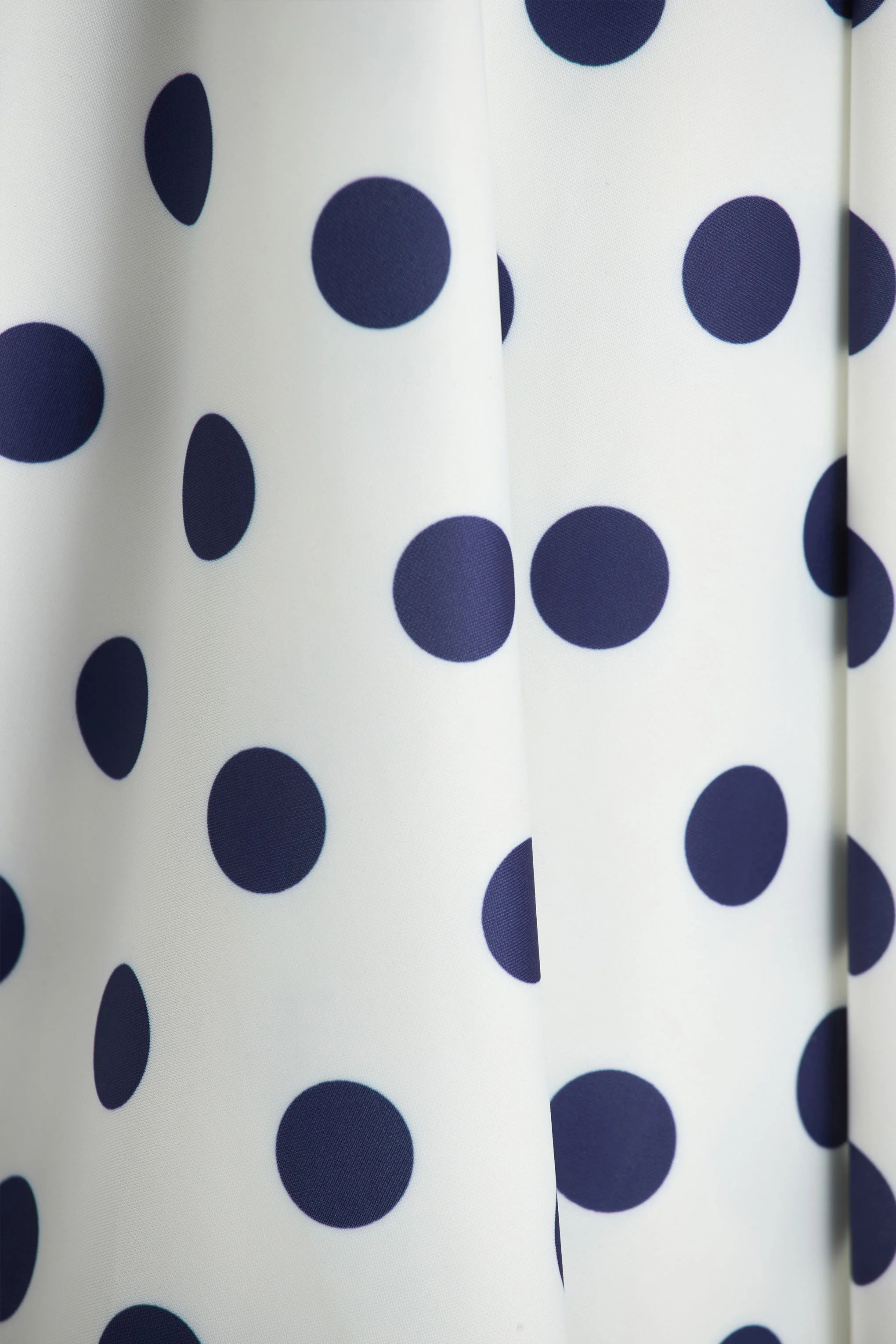 14184-berta-white-and-navy-polka-dot-square-neck-midi-dress-1.webp
