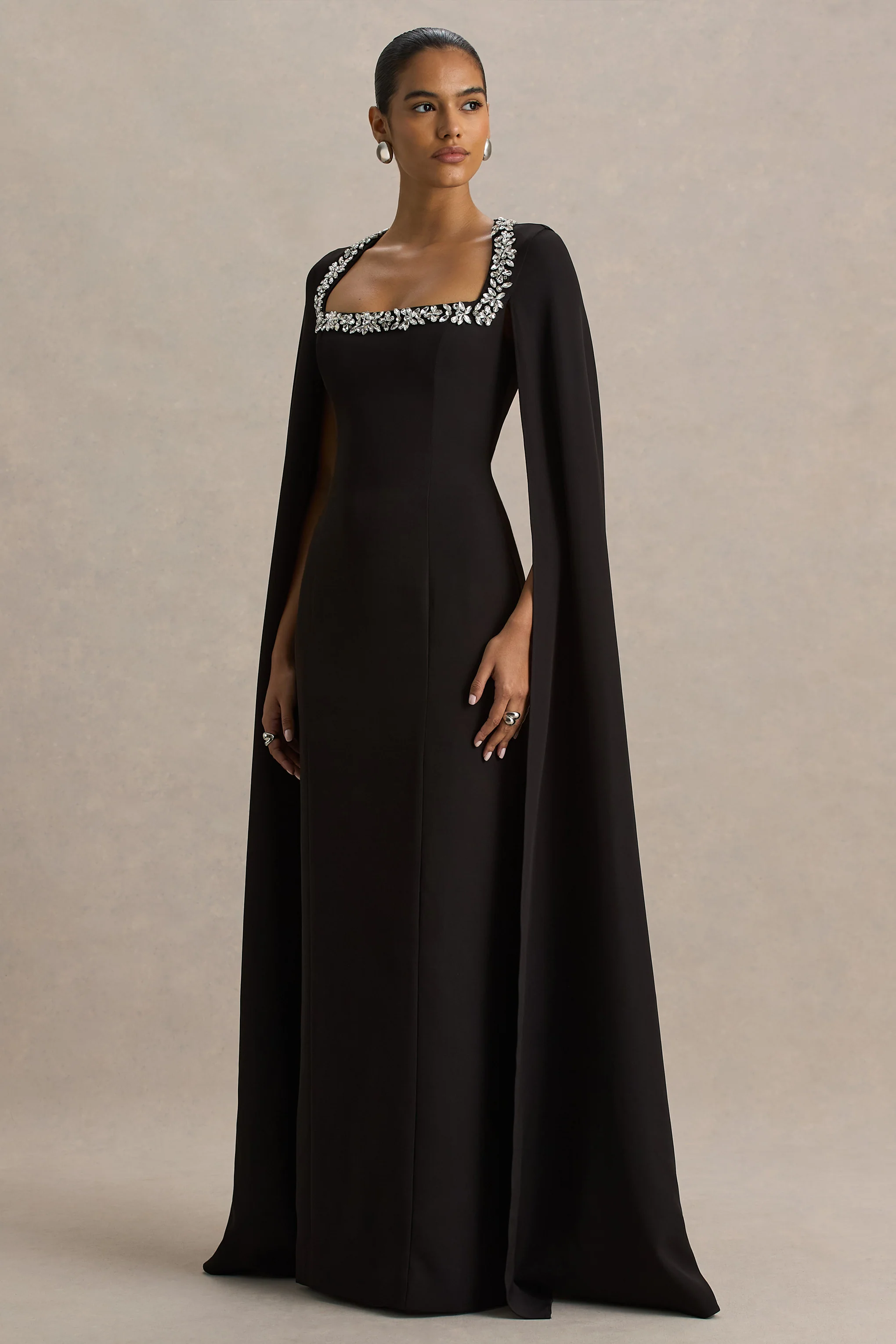 14295-glossy-black-woven-square-neck-maxi-dress-with-cape-sleeves-and-embellished-detail-1.webp