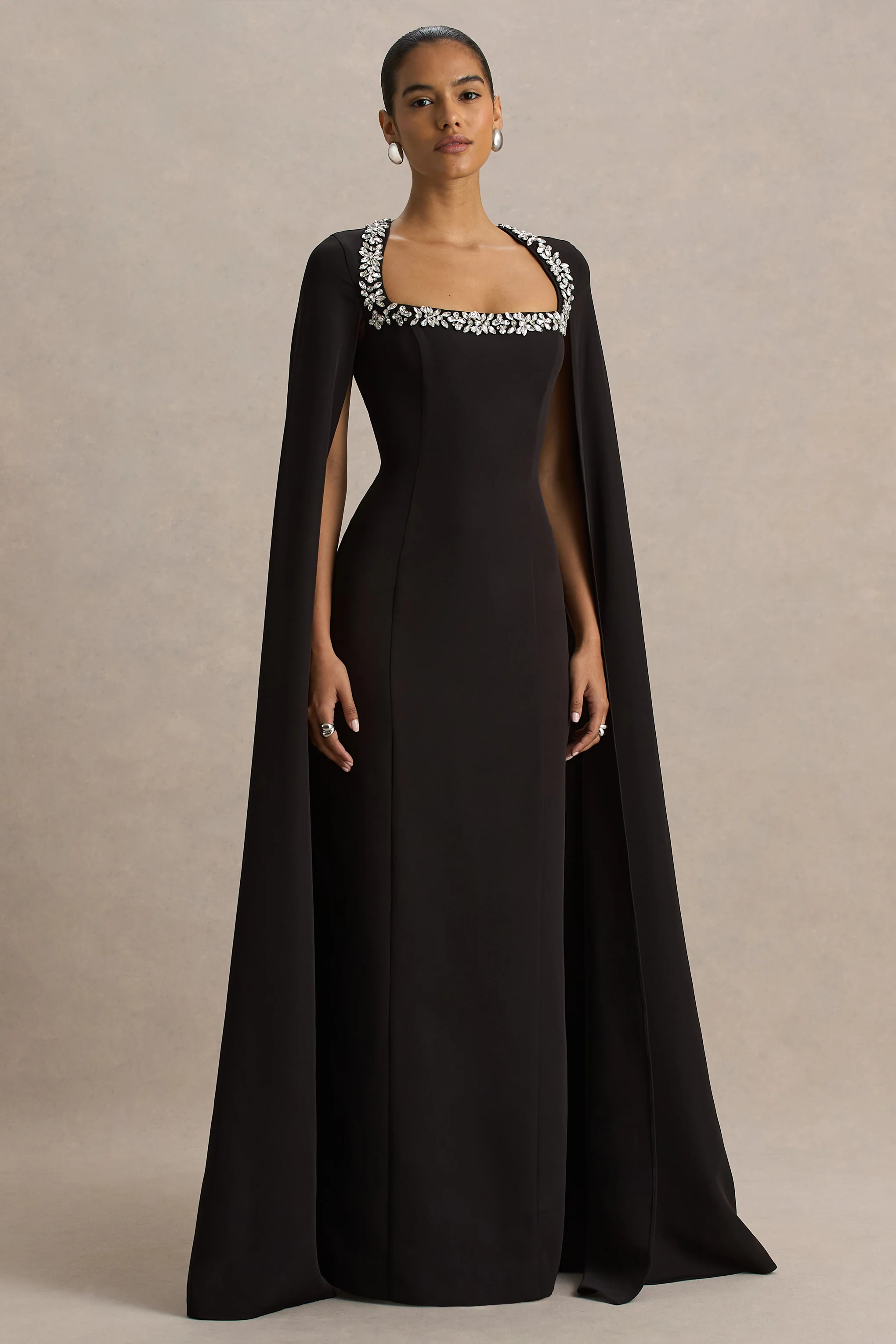 14295-glossy-black-woven-square-neck-maxi-dress-with-cape-sleeves-and-embellished-detail-1.webp