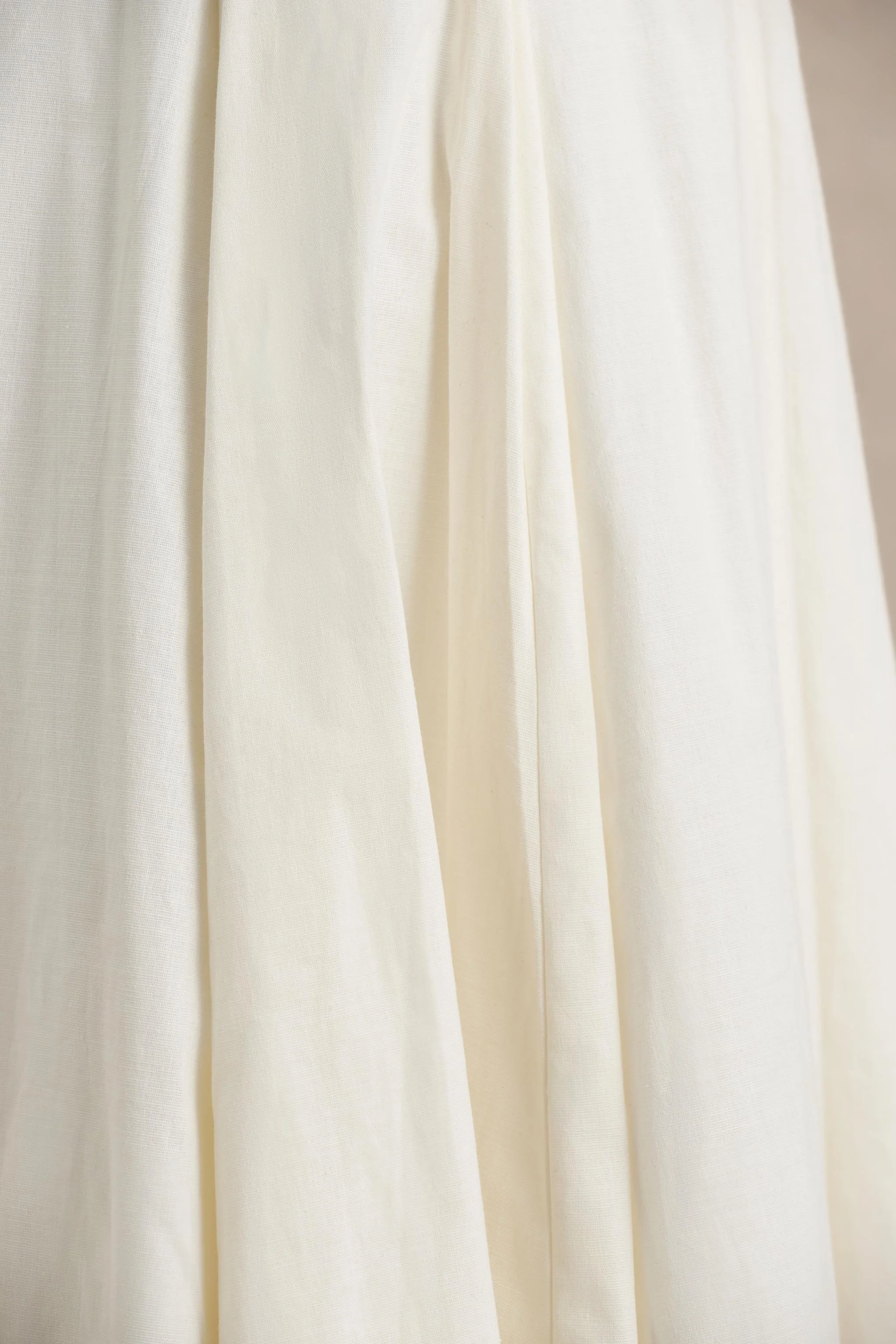 14323-magnolia-white-scoop-neck-midi-dress-with-drop-waist-and-ruffling-detail-1.webp
