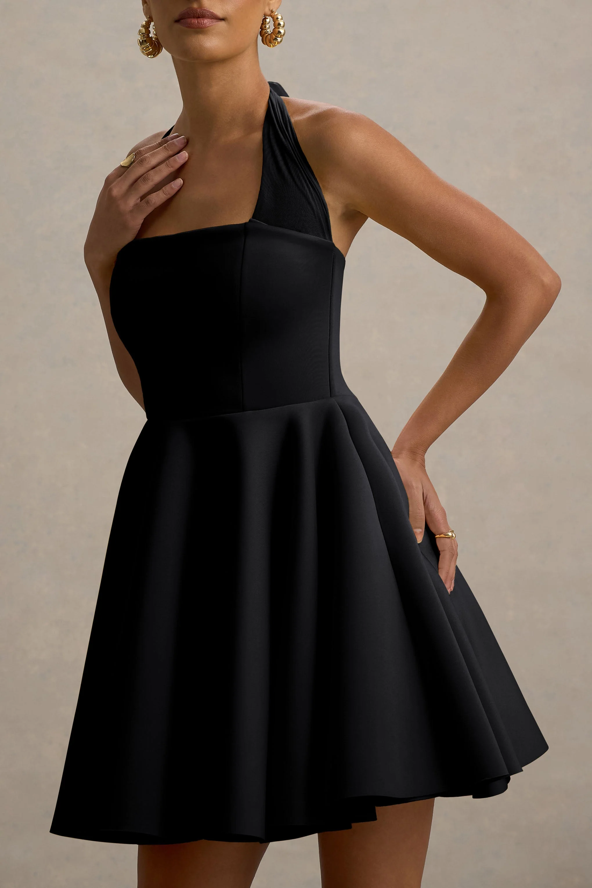 14534-peggy-black-halter-neck-skater-mini-dress-1.webp