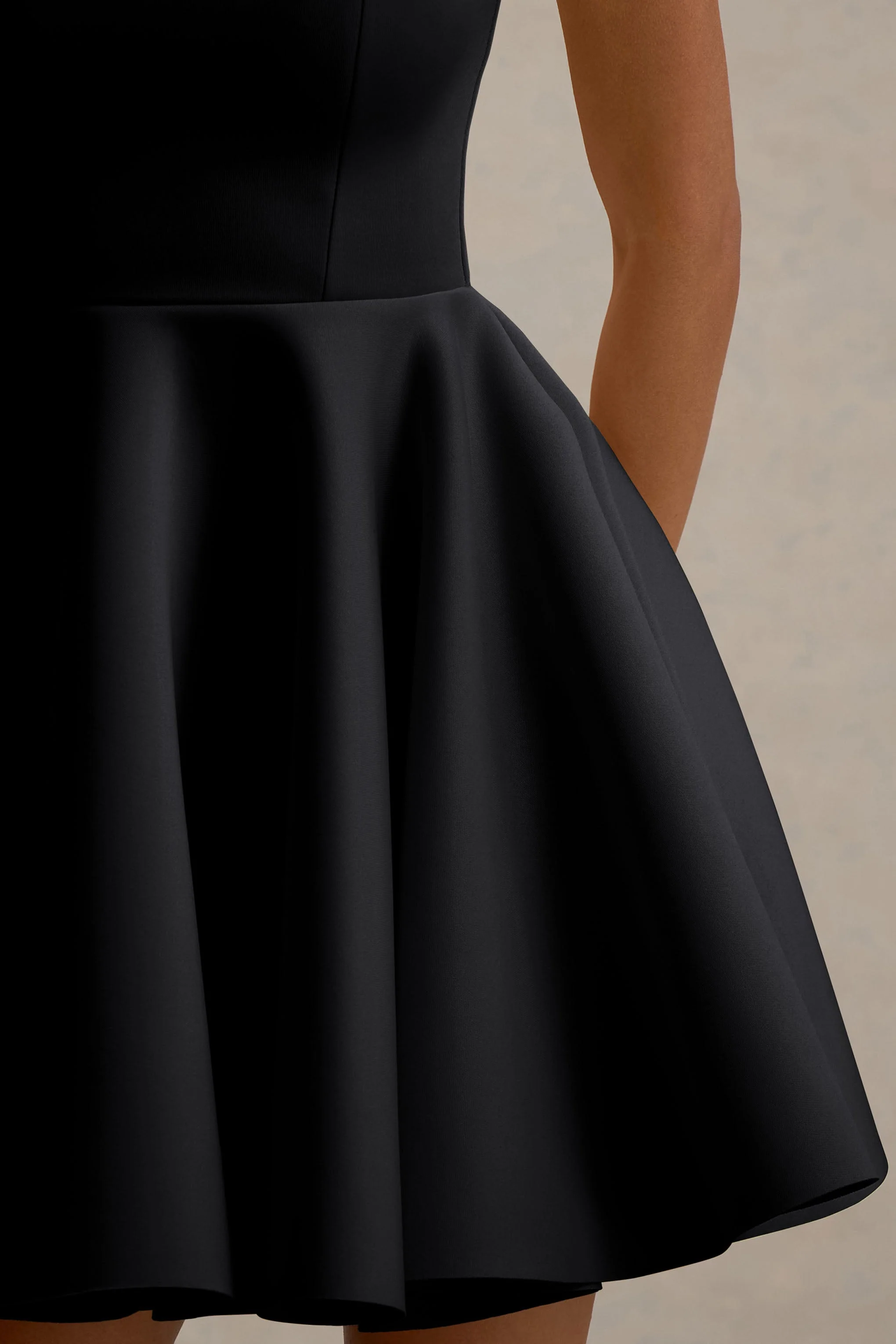 14534-peggy-black-halter-neck-skater-mini-dress-1.webp