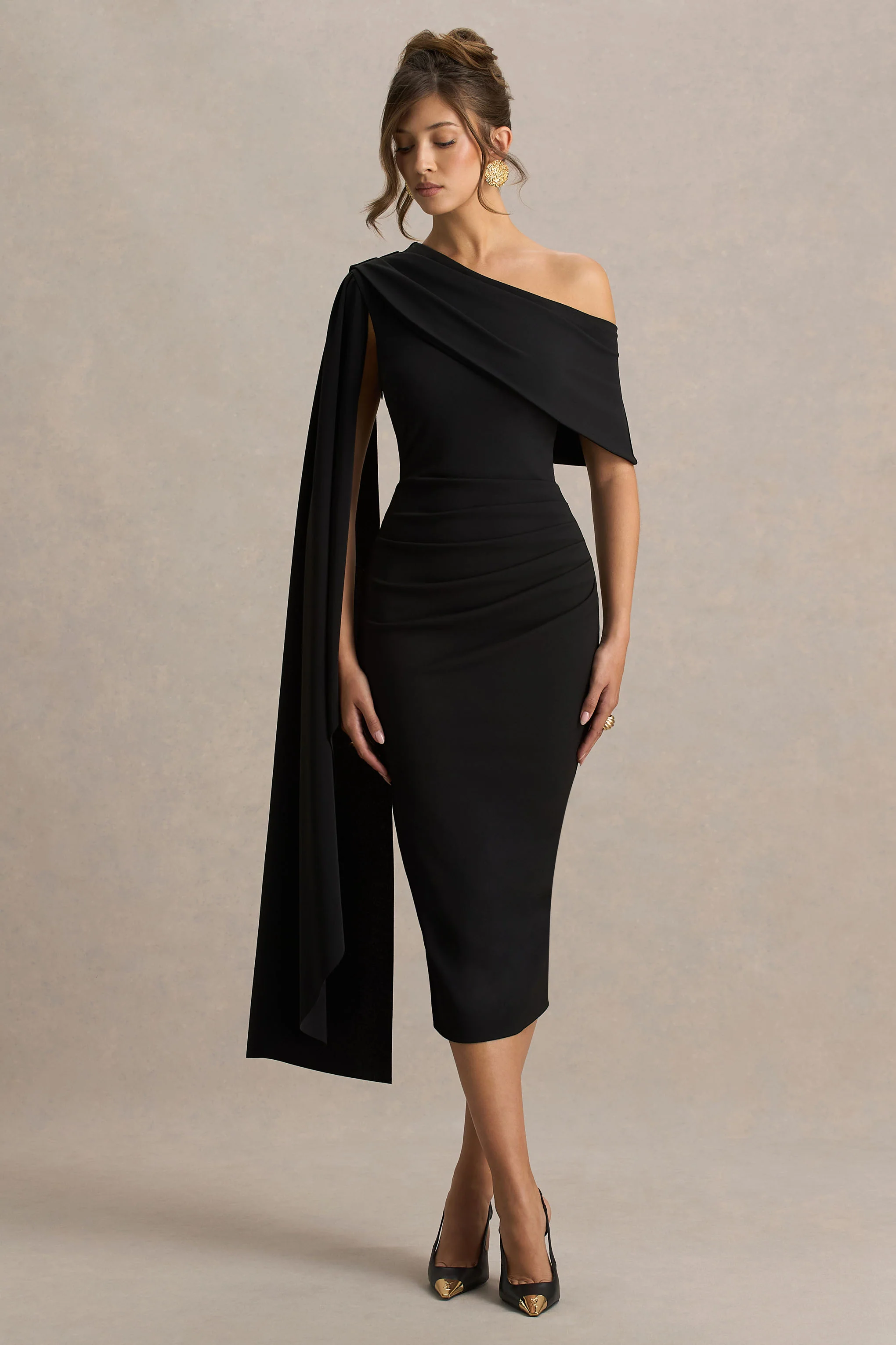 14991-leah-black-asymmetric-neck-midi-dress-with-cape-sleeve-and-draped-detailing-1.webp