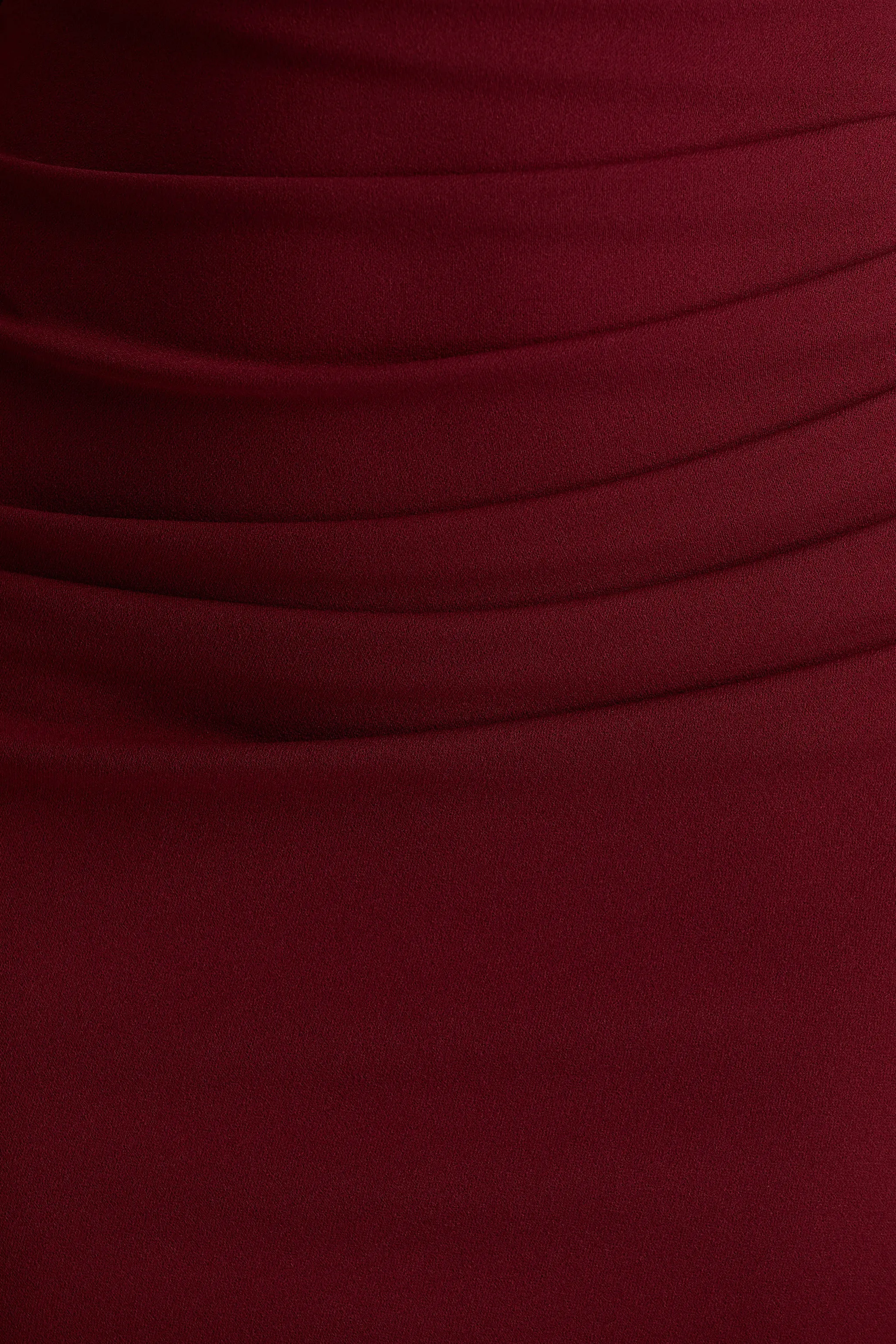 14998-leah-burgundy-asymmetric-neck-midi-dress-with-cape-sleeve-and-draped-detailing-1.webp