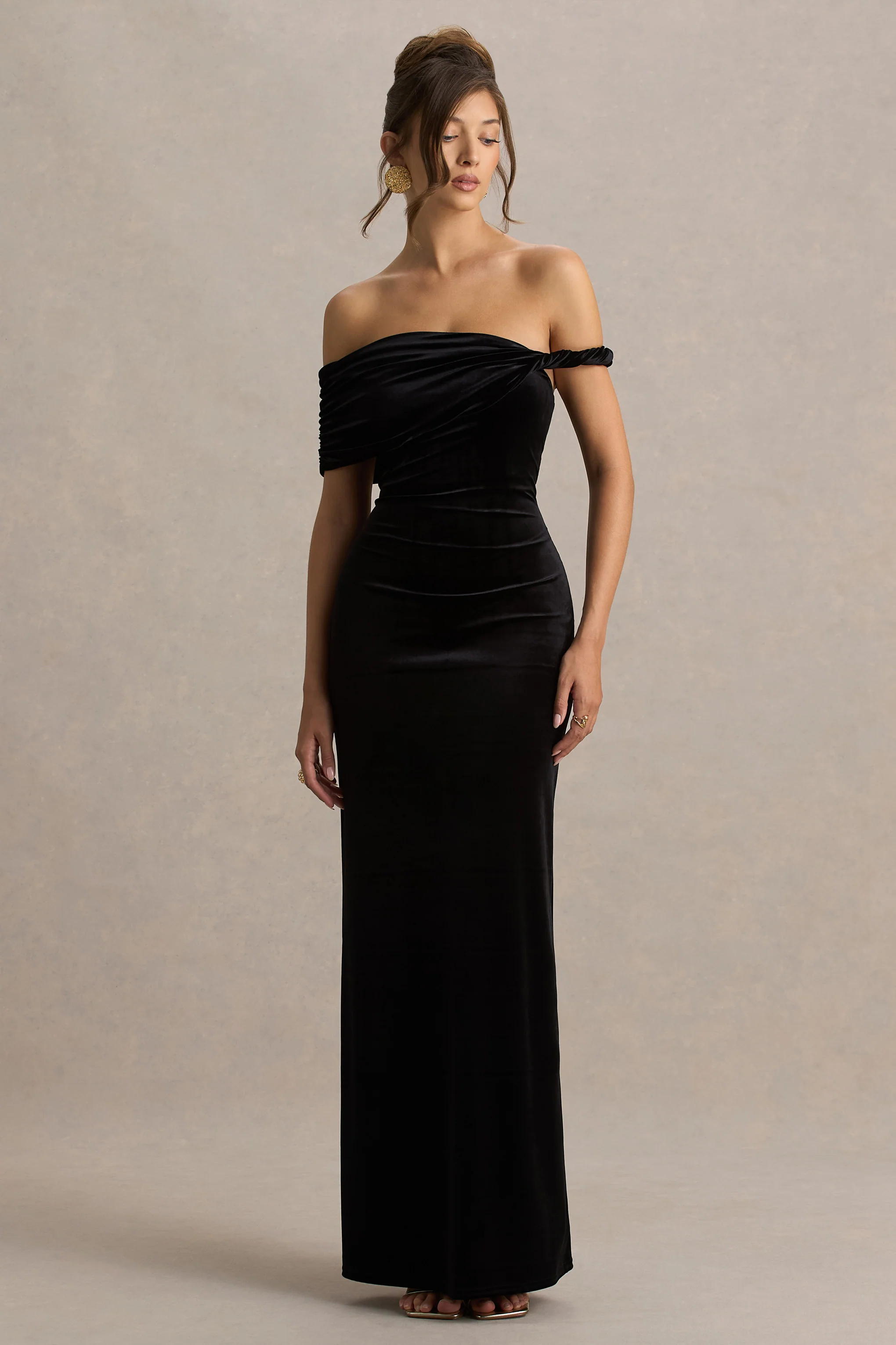 15333-poised-black-velvet-bardot-neck-maxi-dress-with-twist-sleeve-1.webp