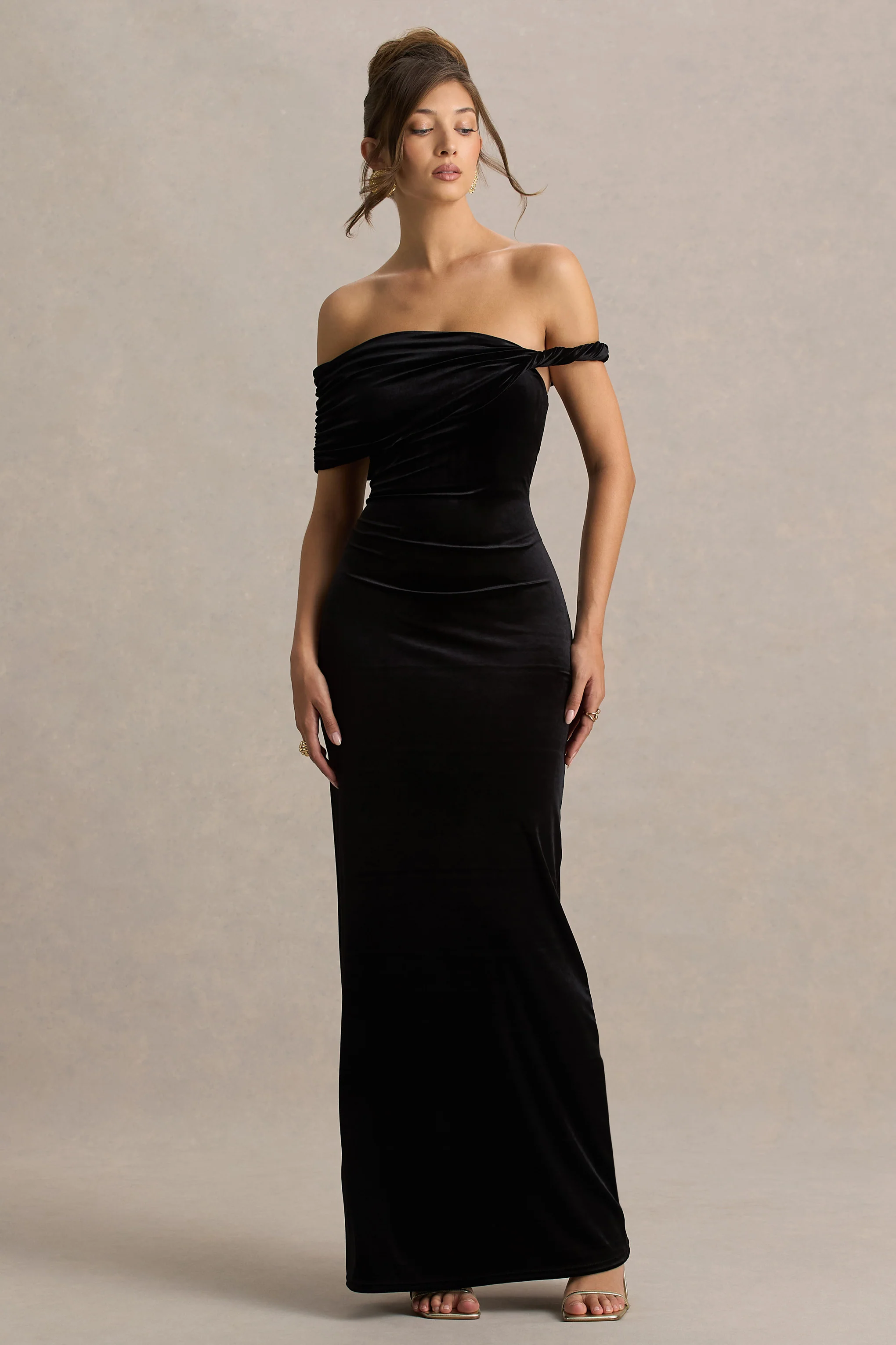 15333-poised-black-velvet-bardot-neck-maxi-dress-with-twist-sleeve-1.webp