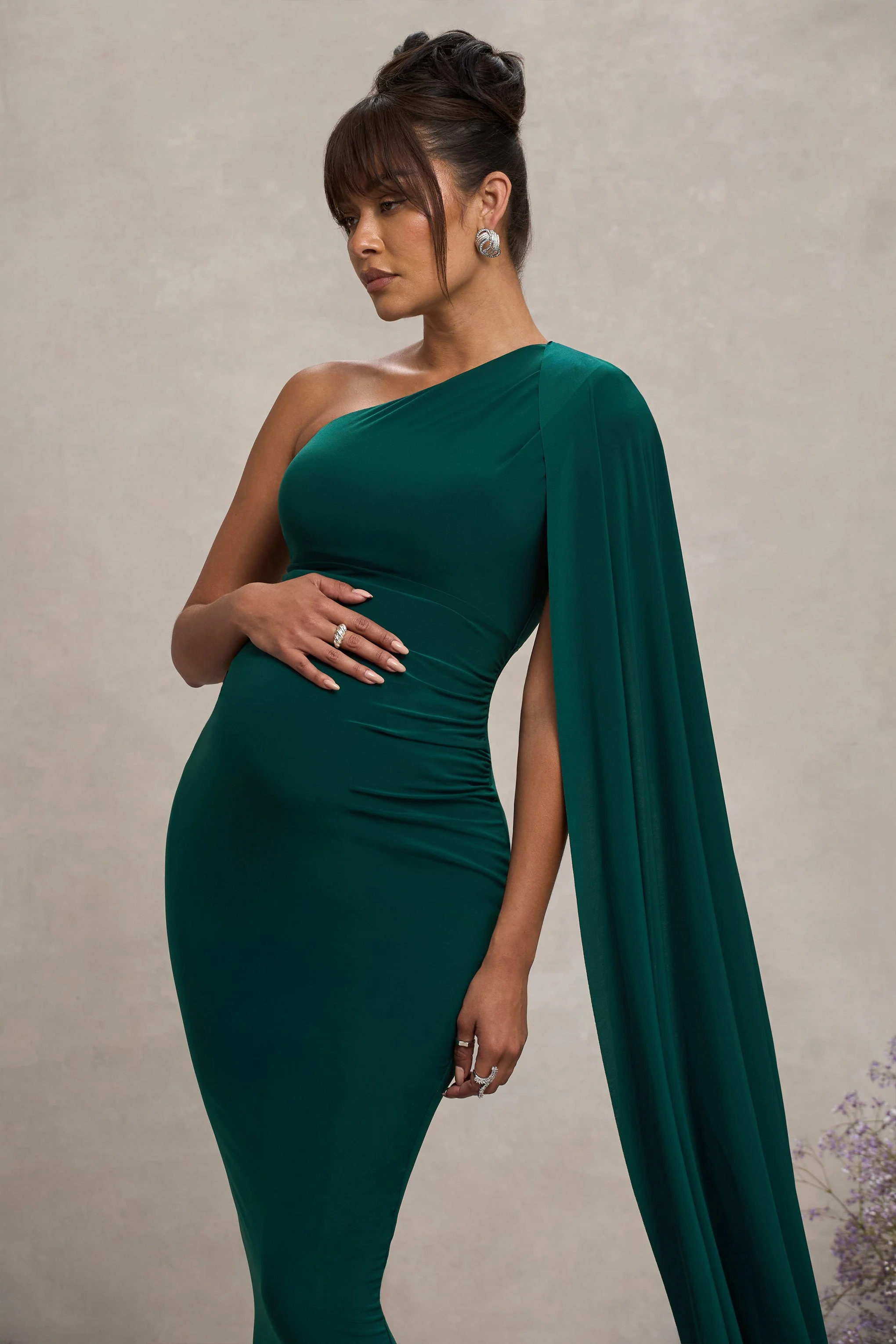 17605-amaryllis-bottle-green-maternity-one-shoulder-maxi-dress-with-cape-sleeve-1.webp