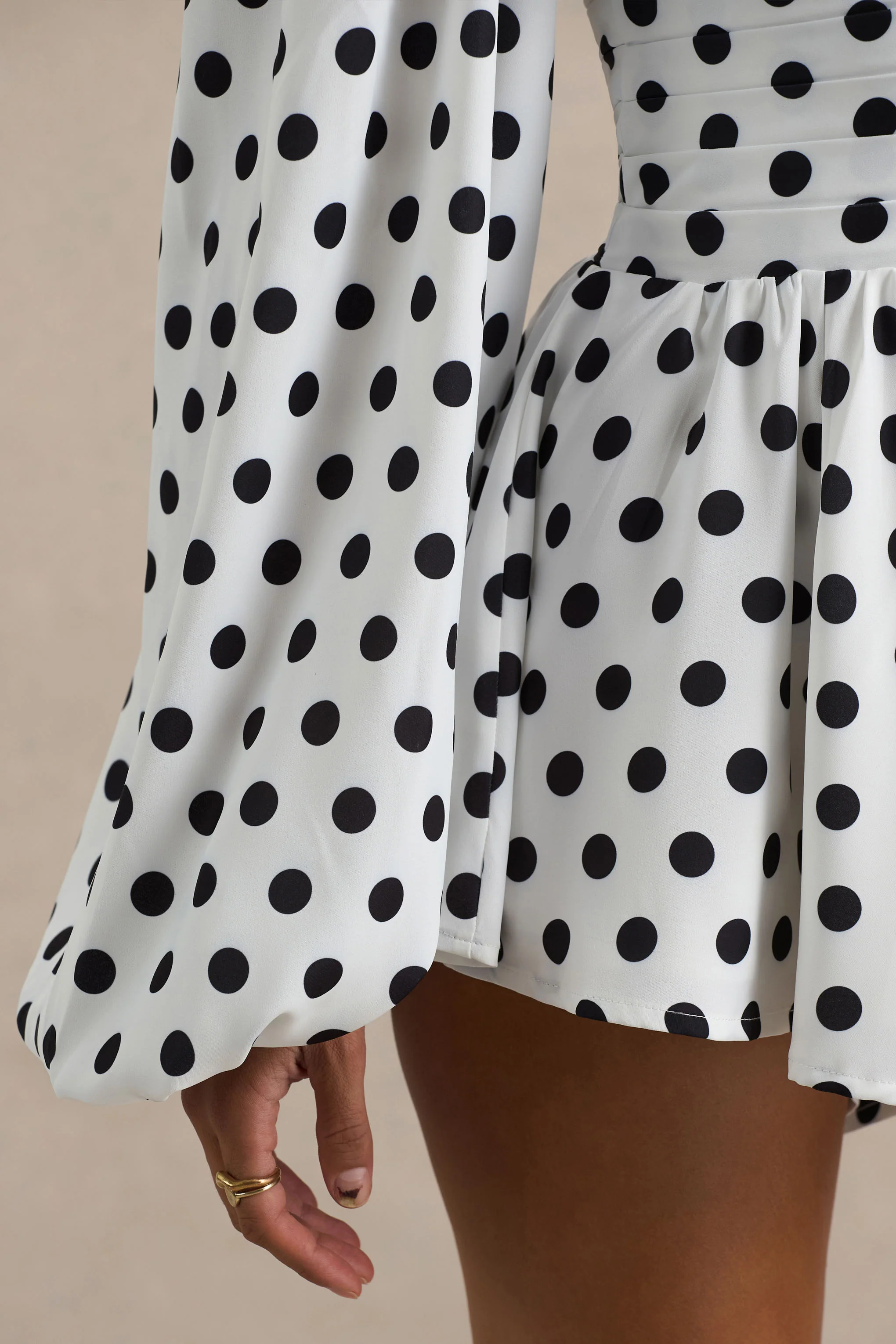 17825-laurel-white-polka-dot-v-neck-balloon-sleeve-playsuit-1.webp