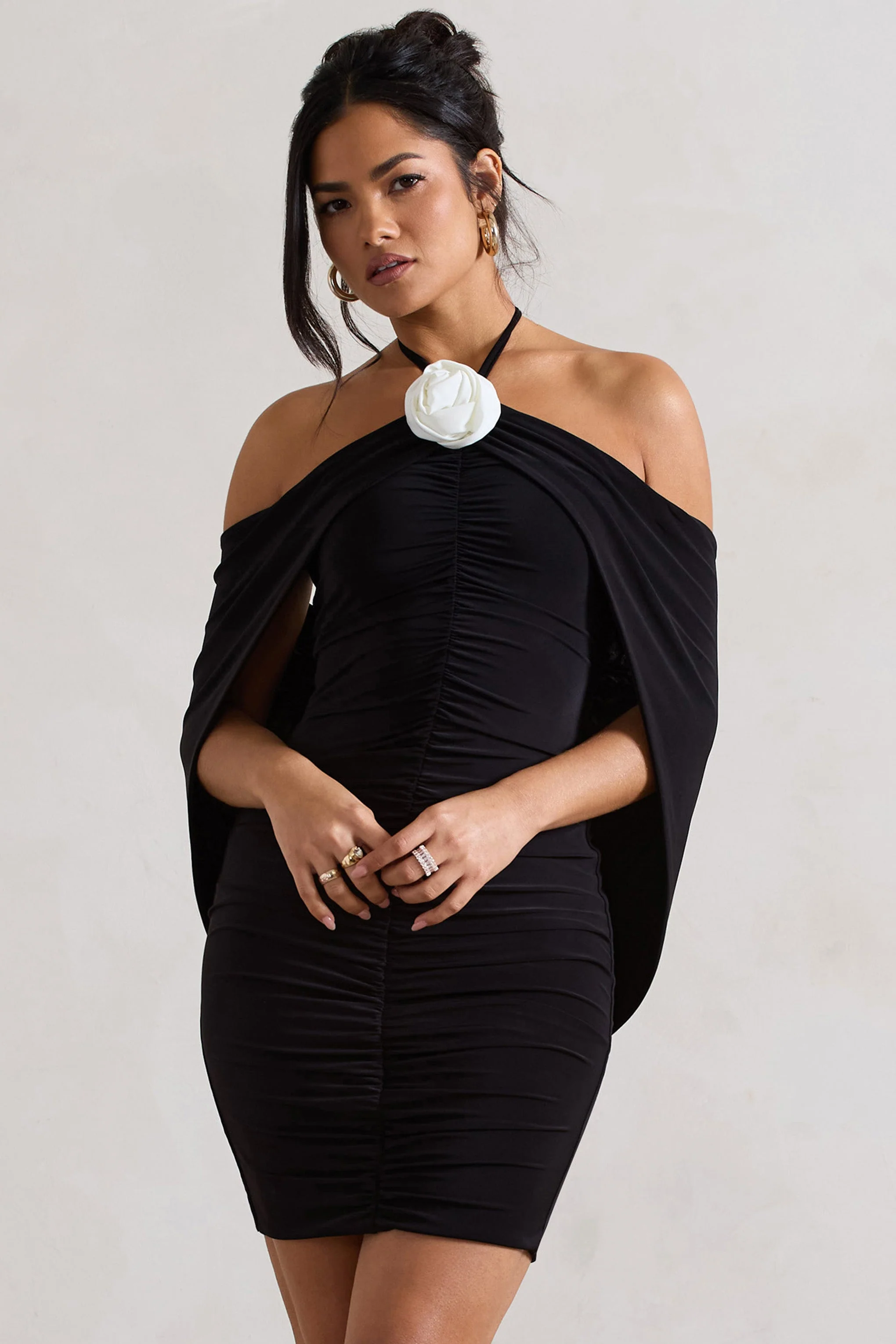 1796-adriana-black-ruched-halter-neck-draped-mini-dress-with-corsage-1.webp