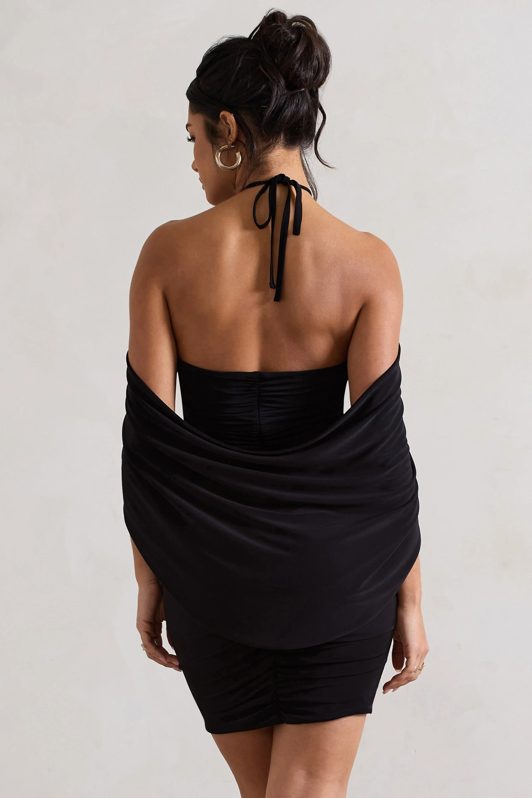 1796-adriana-black-ruched-halter-neck-draped-mini-dress-with-corsage-1.webp