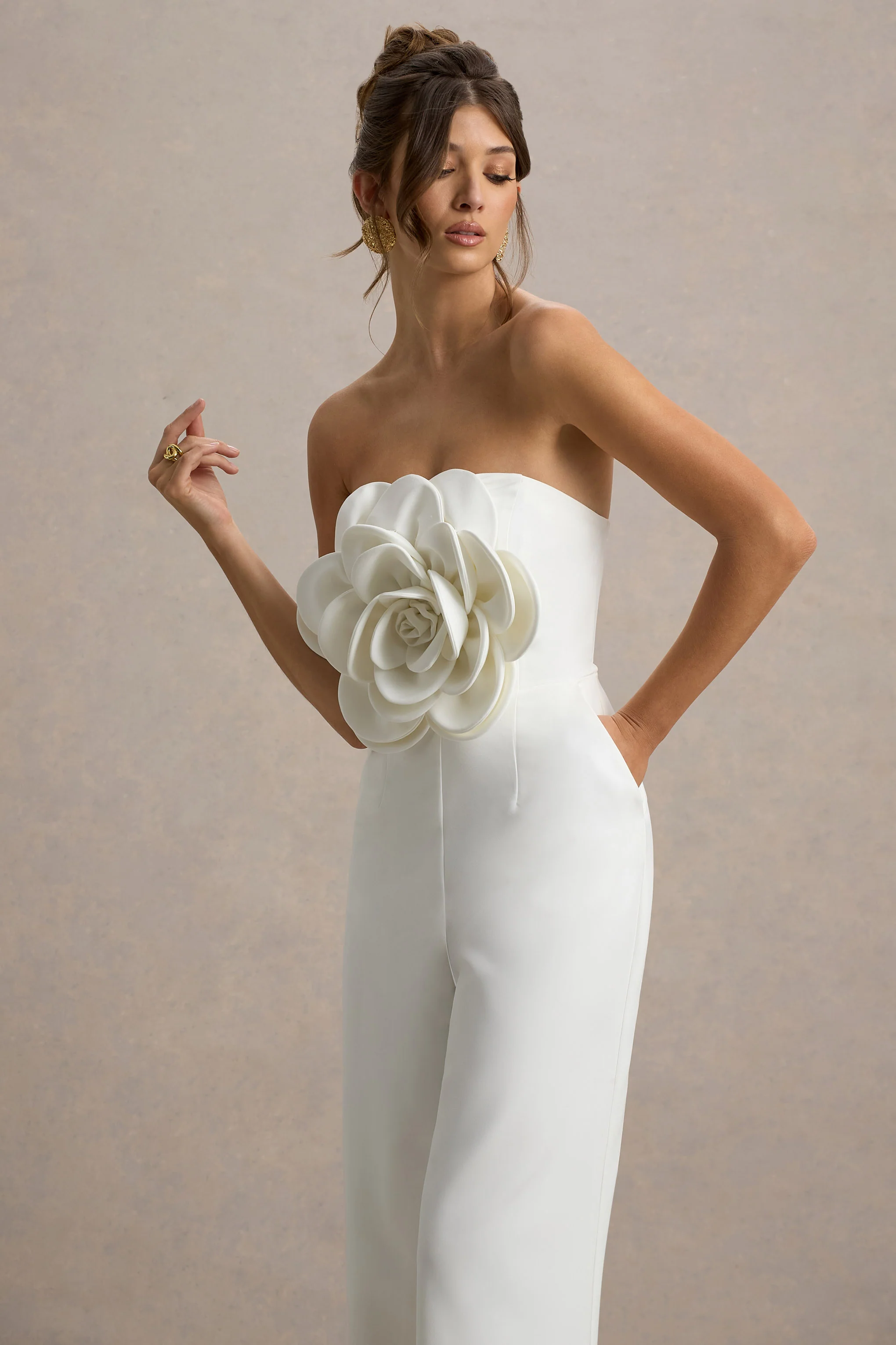 18236-opia-white-bandeau-wide-leg-jumpsuit-with-large-floral-corsage-1.webp