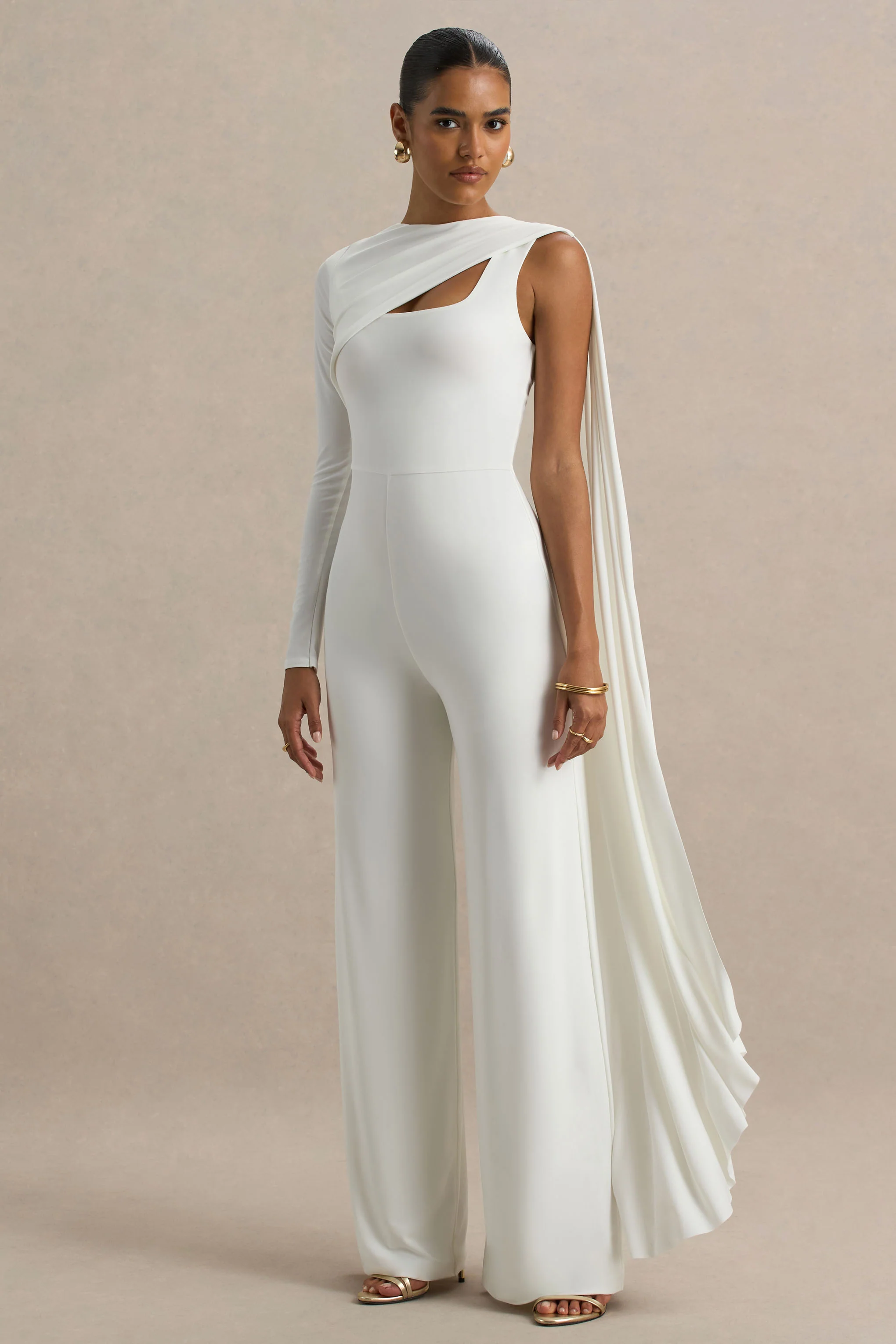 18380-graces-white-high-neck-jumpsuit-with-cape-sleeve-1.webp