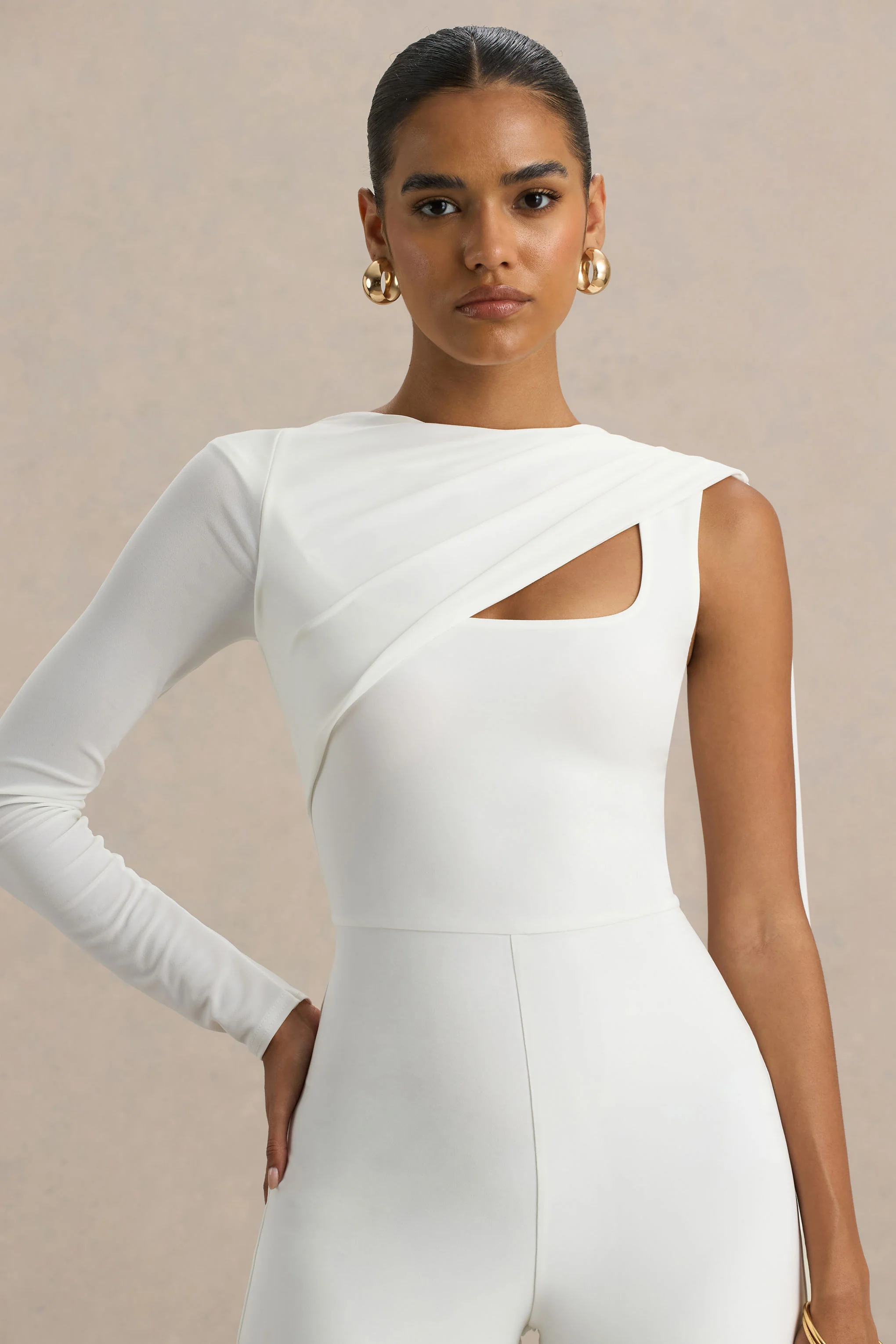 18380-graces-white-high-neck-jumpsuit-with-cape-sleeve-1.webp