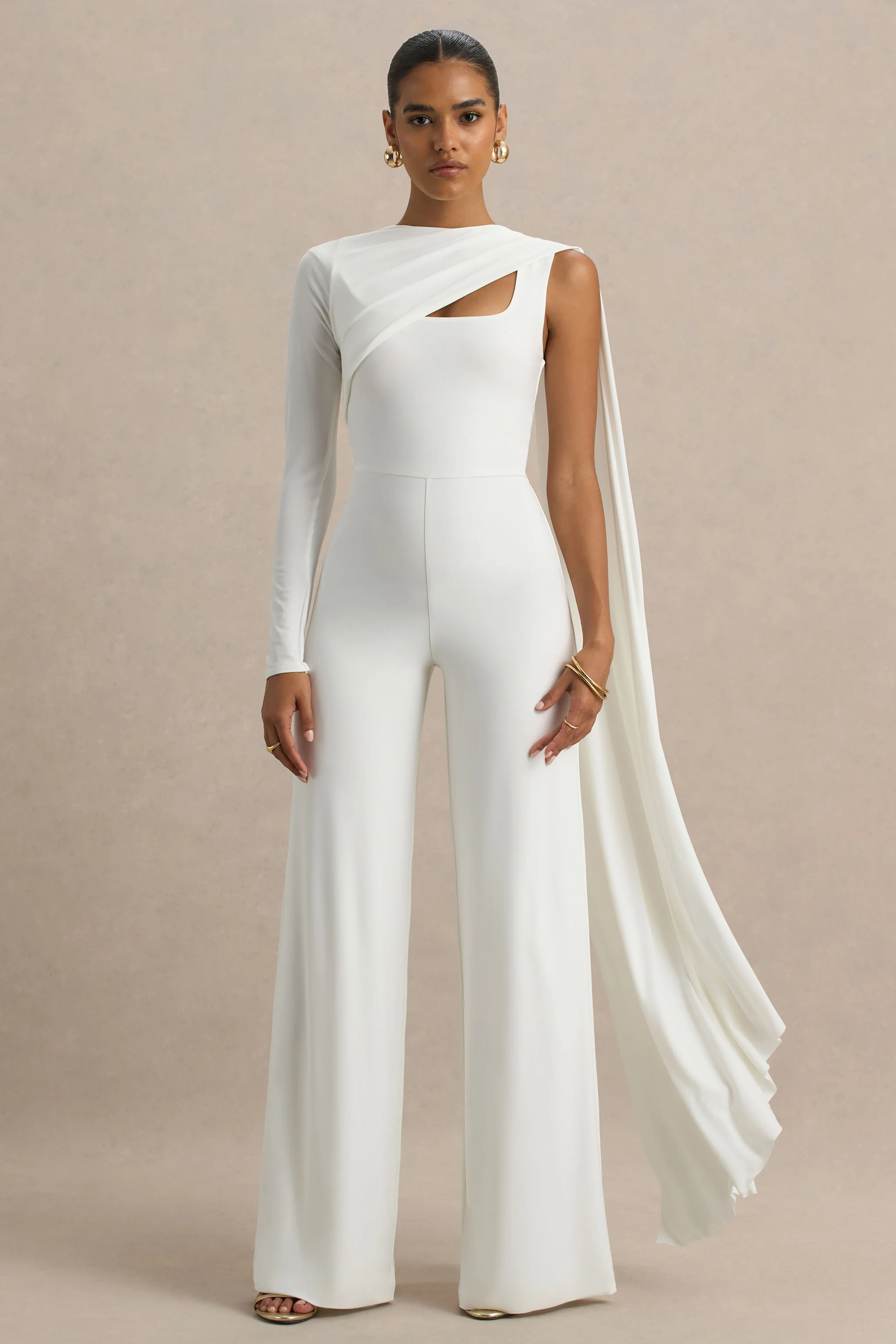18380-graces-white-high-neck-jumpsuit-with-cape-sleeve-1.webp