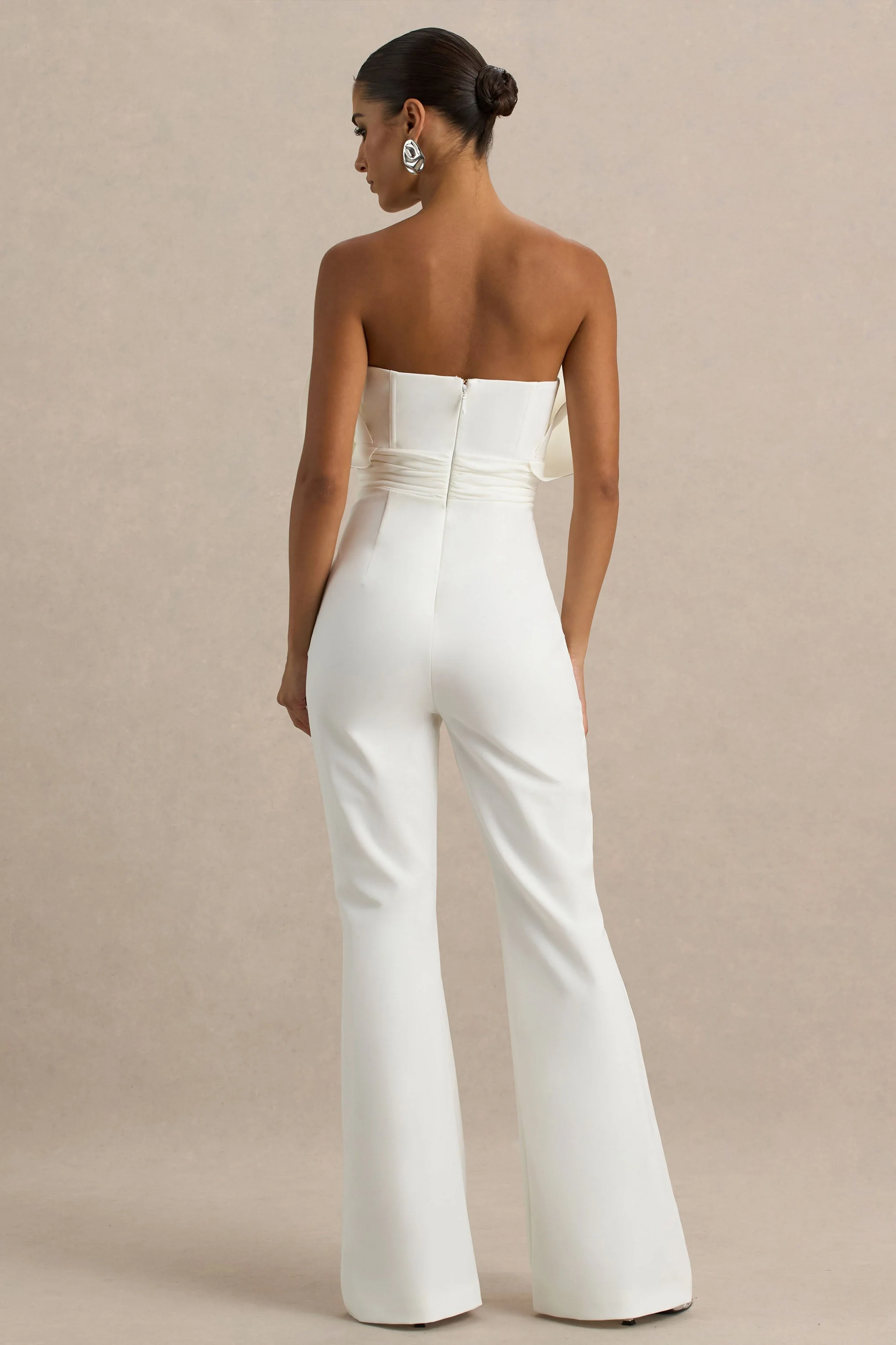 18442-riga-white-ruffled-asymmetric-jumpsuit-1.webp