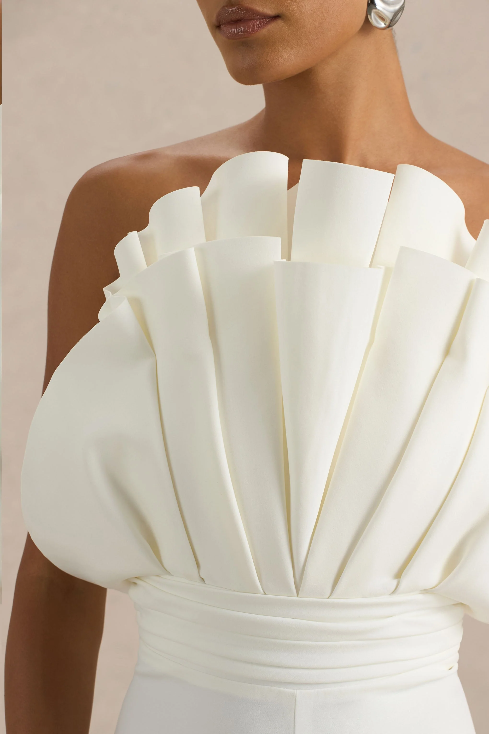 18442-riga-white-ruffled-asymmetric-jumpsuit-1.webp