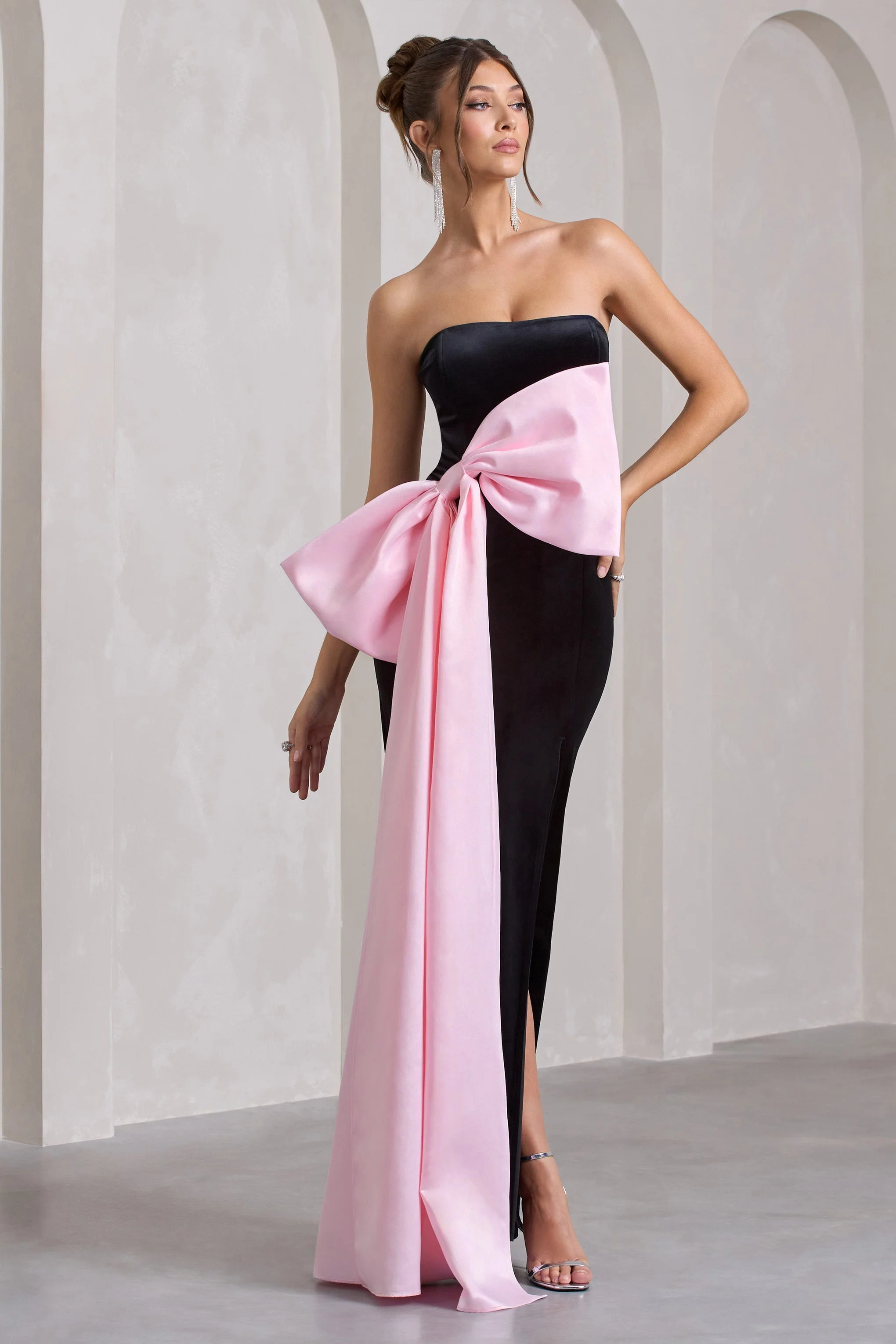 1972-best-wishes-black-velvet-bandeau-split-maxi-dress-with-oversized-pink-bow-1.webp