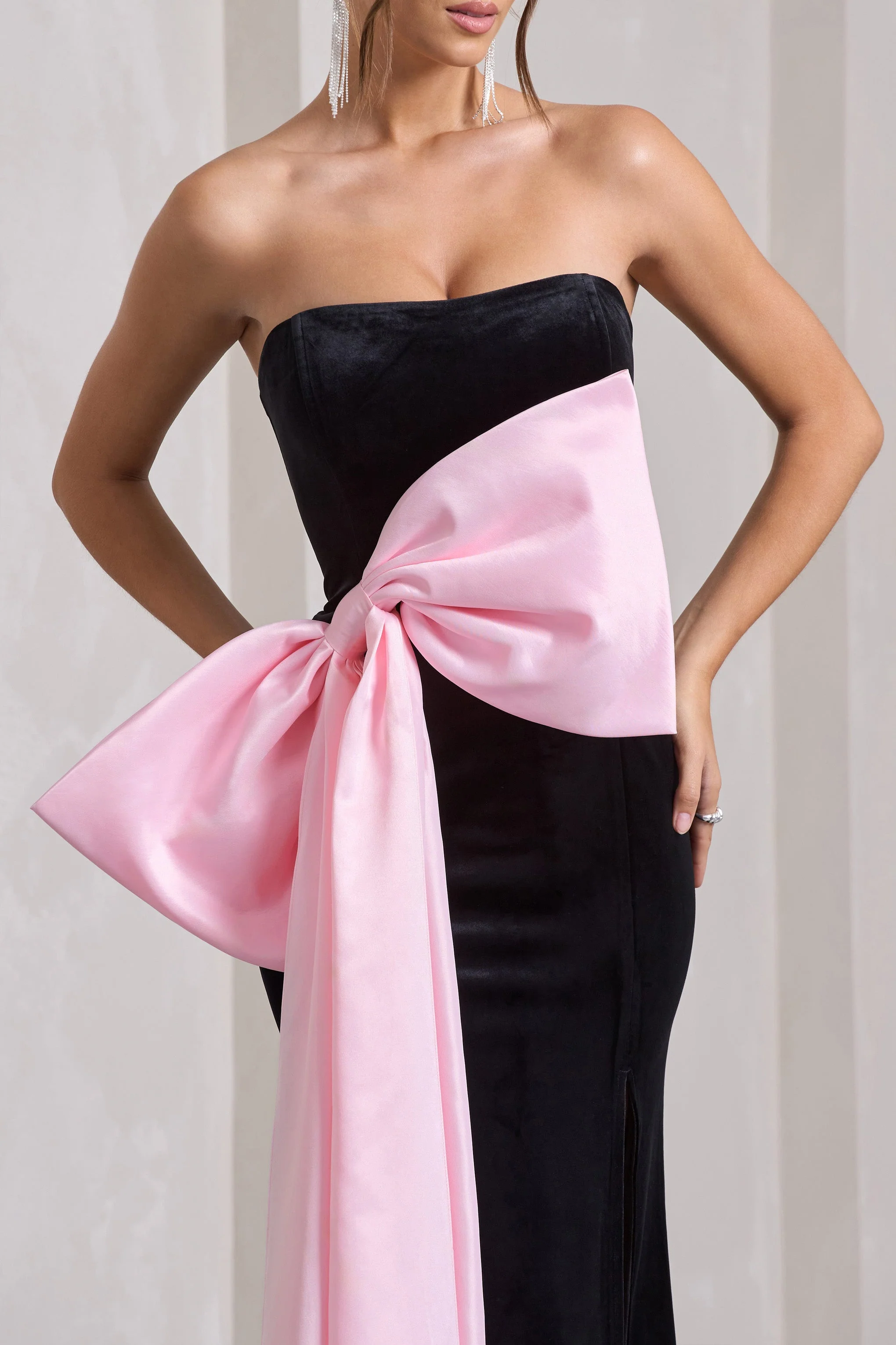 1972-best-wishes-black-velvet-bandeau-split-maxi-dress-with-oversized-pink-bow-1.webp