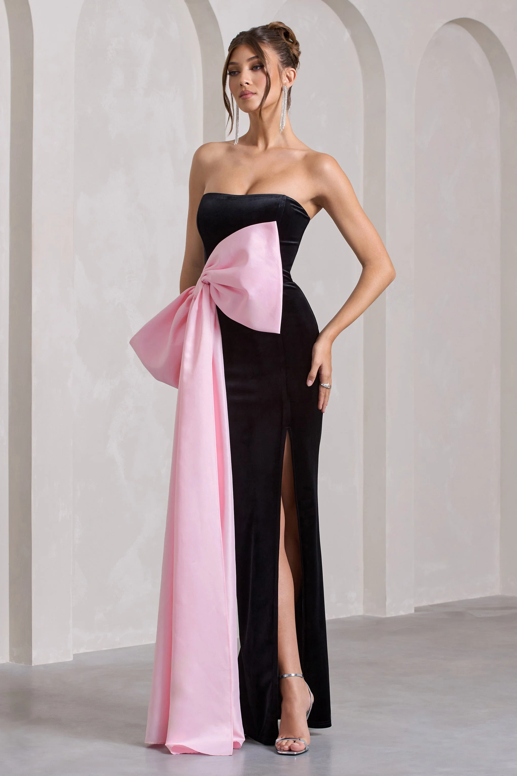 1972-best-wishes-black-velvet-bandeau-split-maxi-dress-with-oversized-pink-bow-1.webp