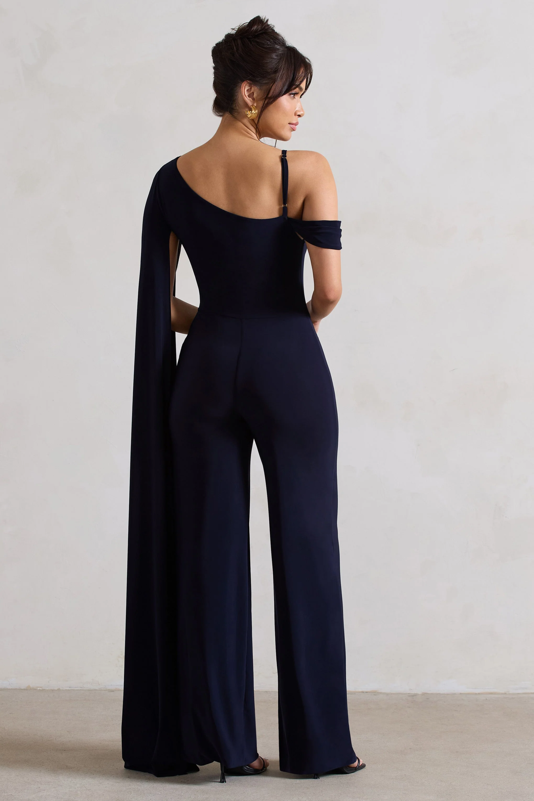20540-jelena-navy-asymmetric-draped-straight-leg-jumpsuit-with-cape-sleeve-1.webp