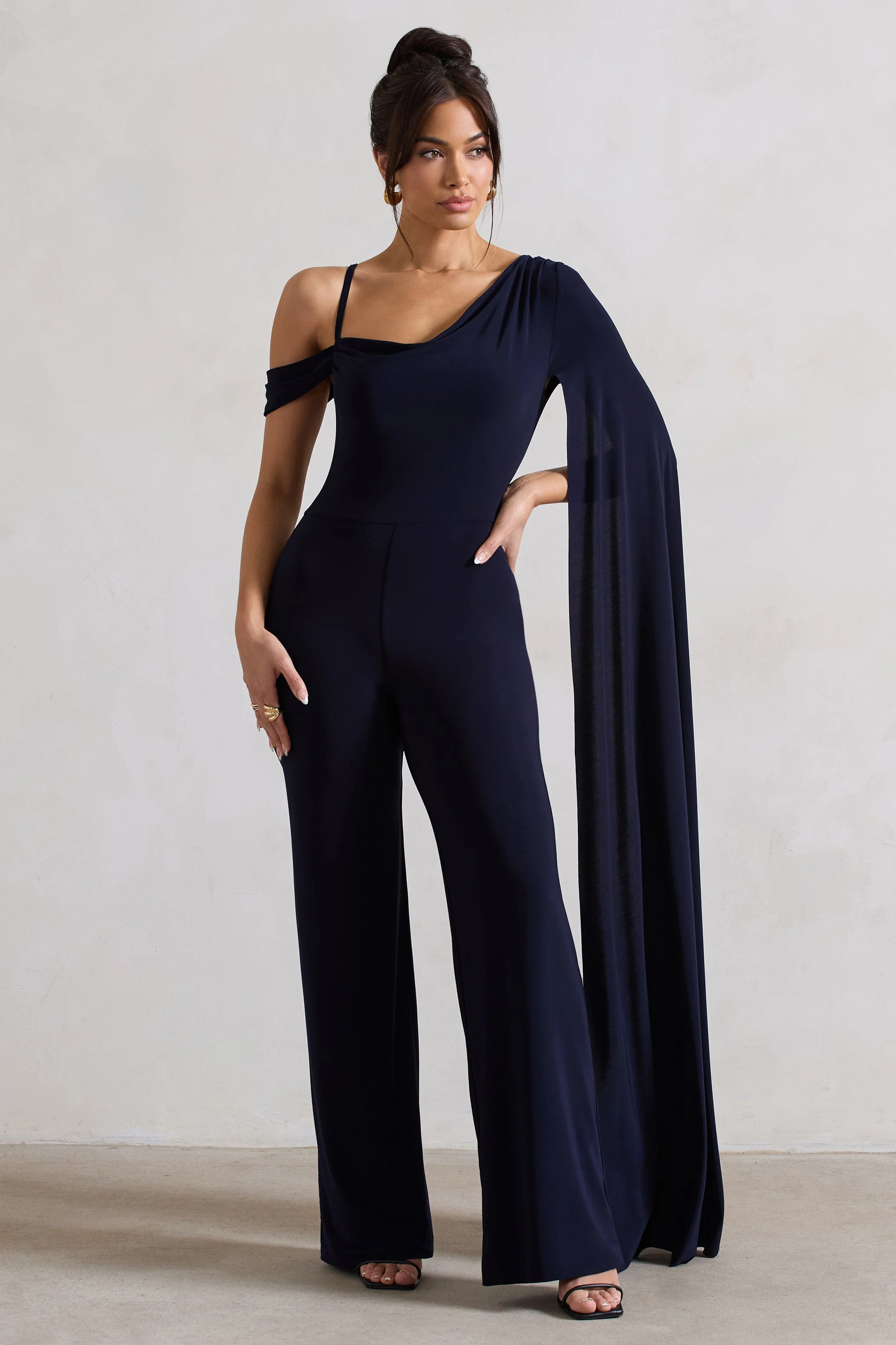 20540-jelena-navy-asymmetric-draped-straight-leg-jumpsuit-with-cape-sleeve-1.webp