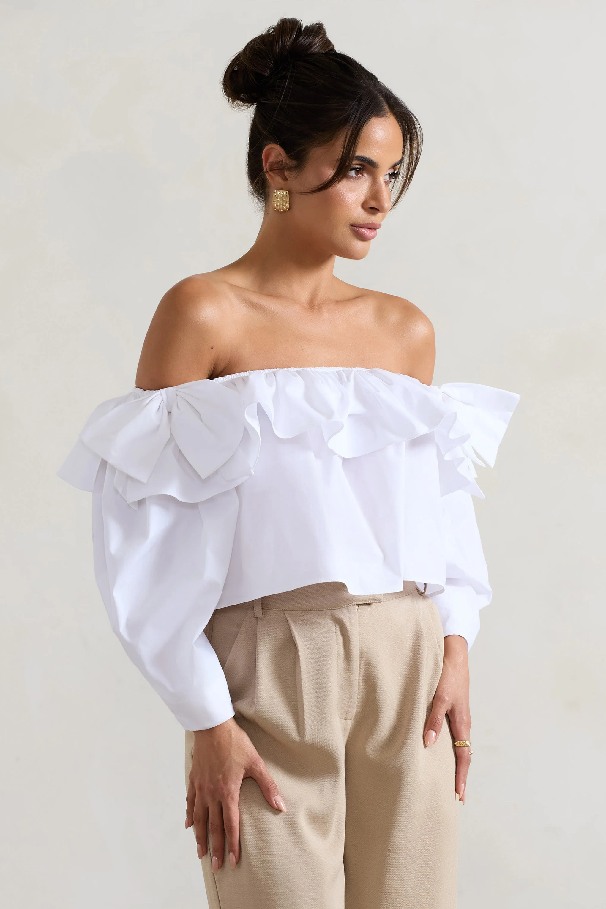 20850-cove-white-bardot-puff-sleeve-ruffle-top-with-bows-1.webp