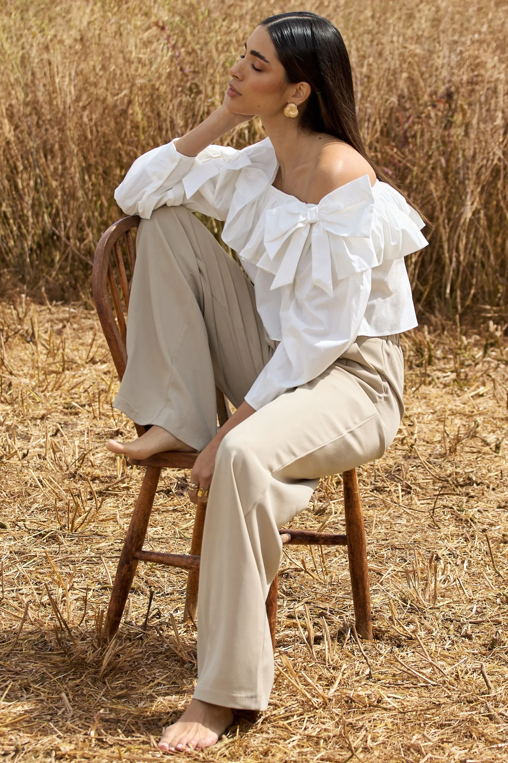 20850-cove-white-bardot-puff-sleeve-ruffle-top-with-bows-1.webp