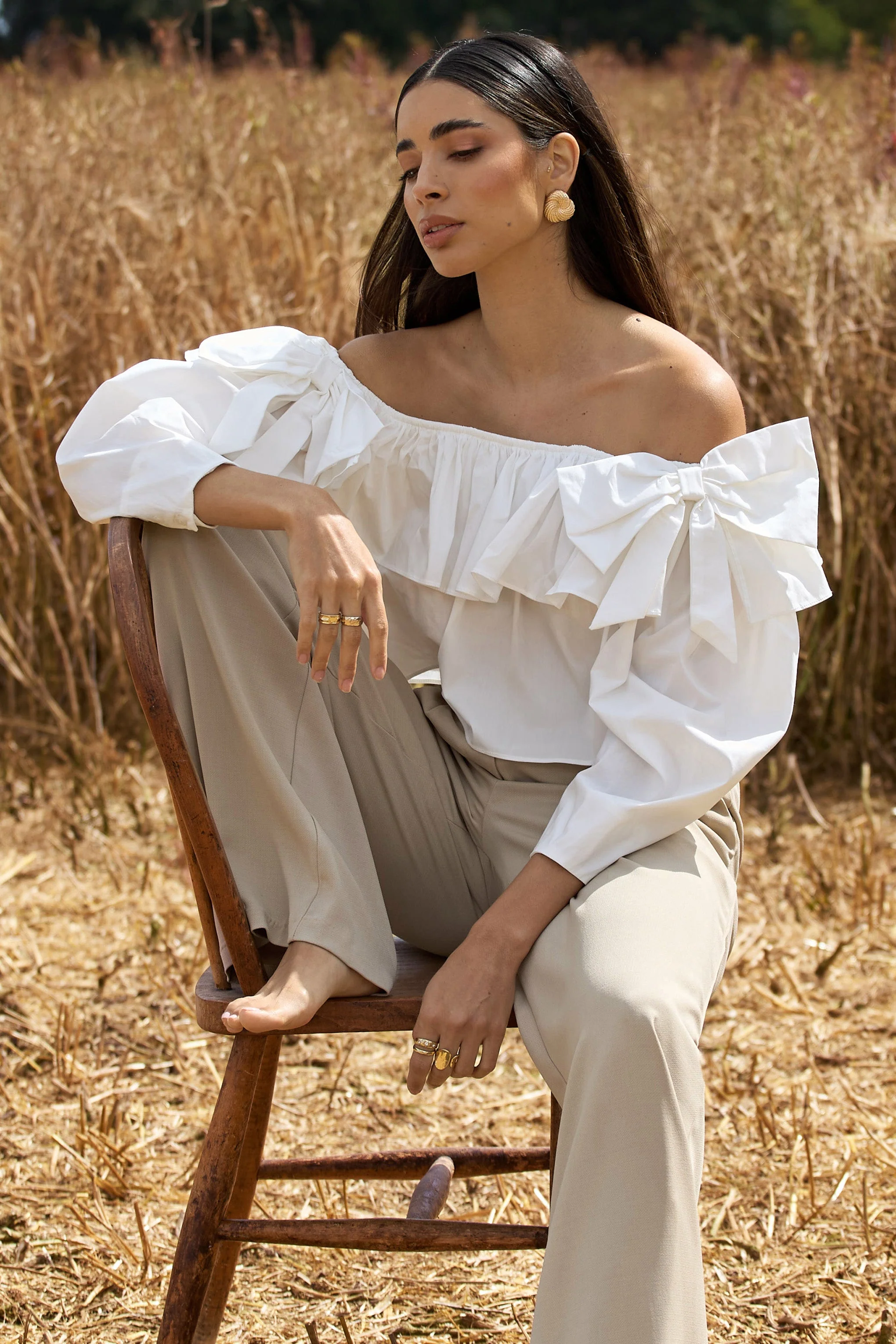 20850-cove-white-bardot-puff-sleeve-ruffle-top-with-bows-1.webp