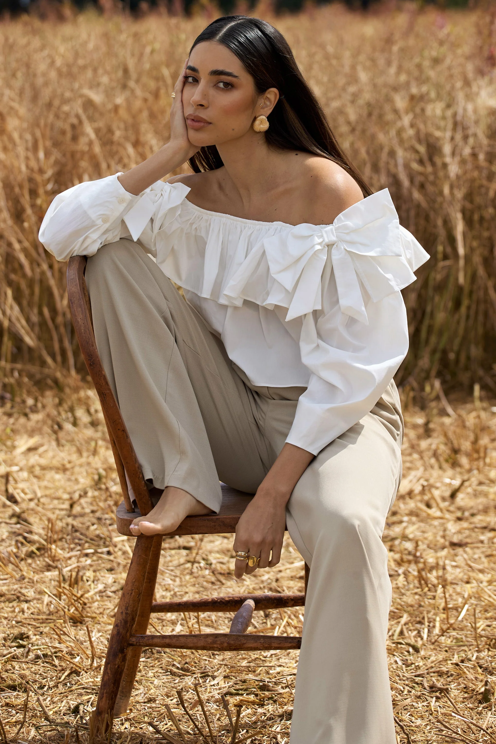 20850-cove-white-bardot-puff-sleeve-ruffle-top-with-bows-1.webp