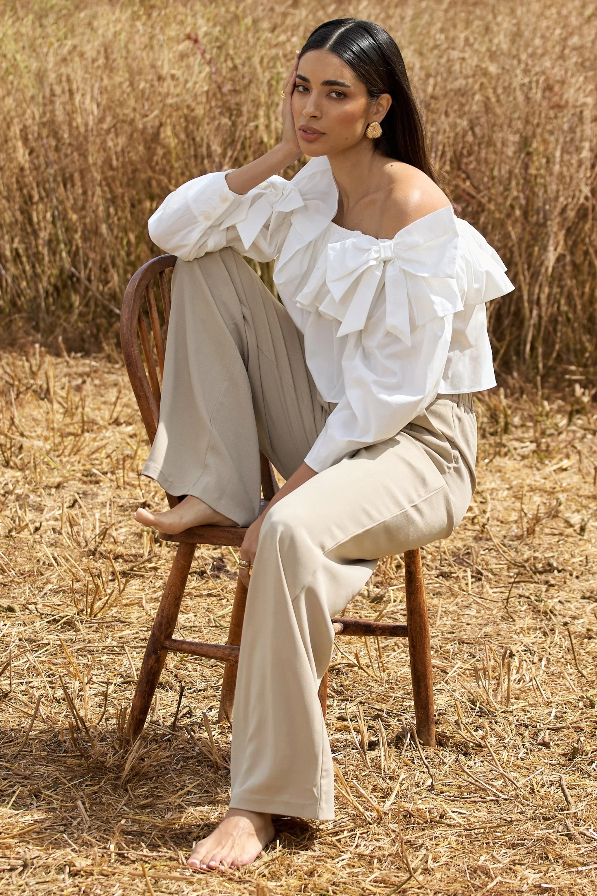 20850-cove-white-bardot-puff-sleeve-ruffle-top-with-bows-1.webp