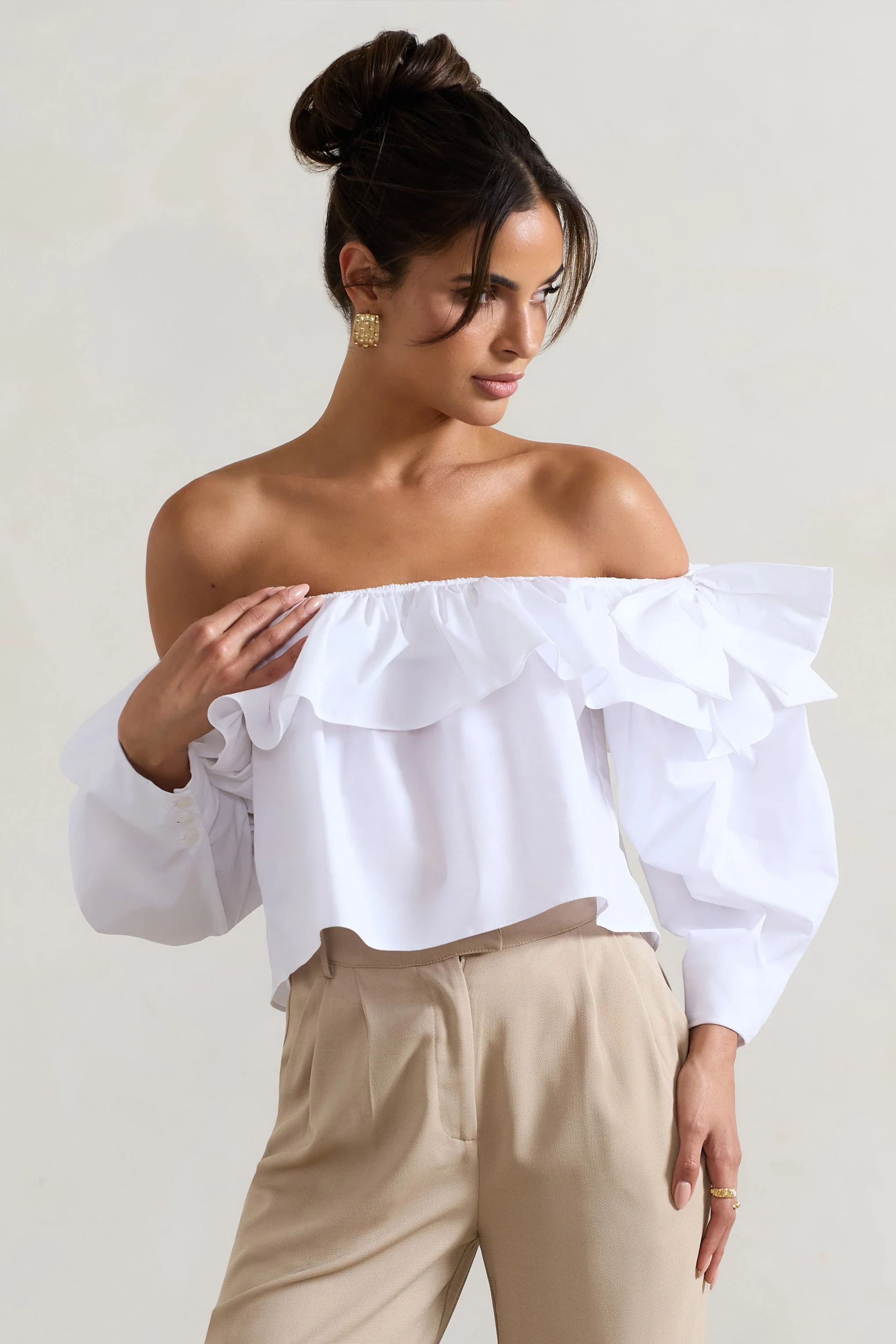 20850-cove-white-bardot-puff-sleeve-ruffle-top-with-bows-1.webp