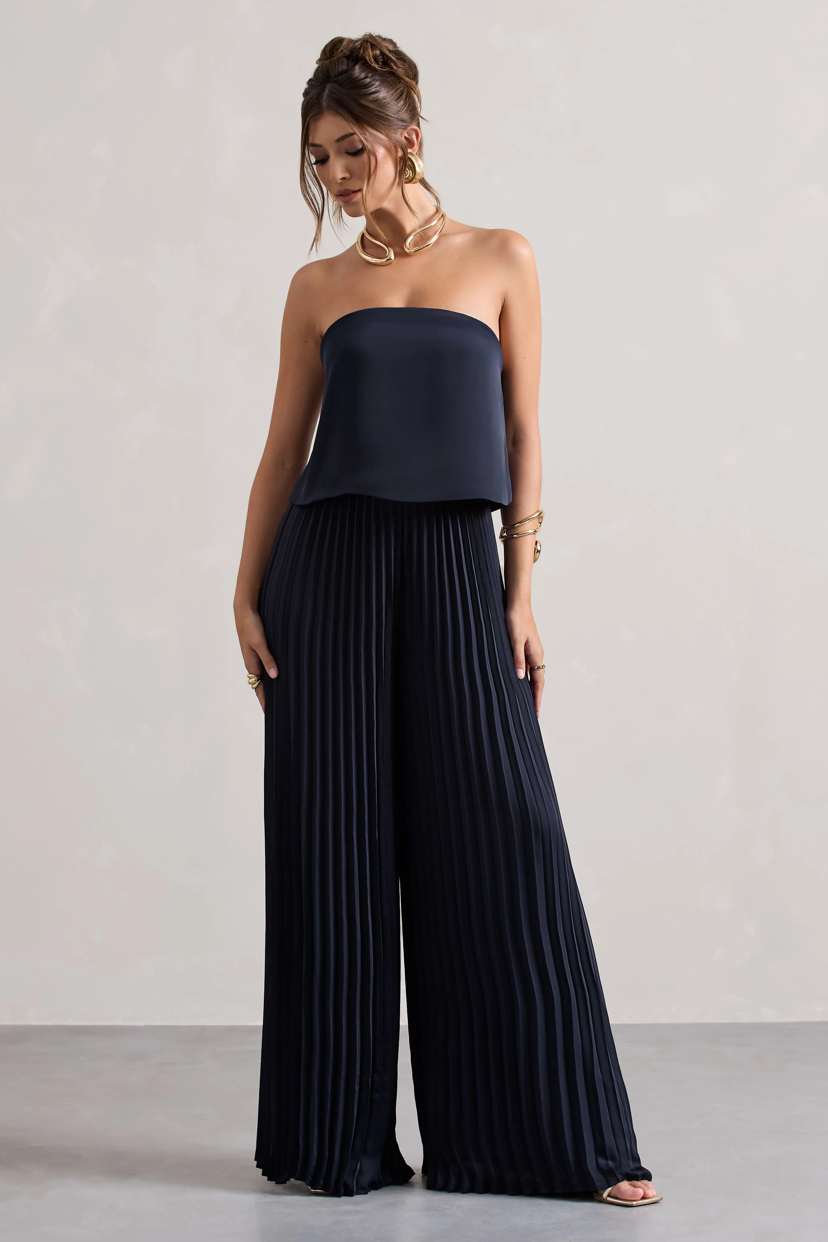 20942-tammi-navy-satin-strapless-plisse-wide-leg-jumpsuit-1.webp