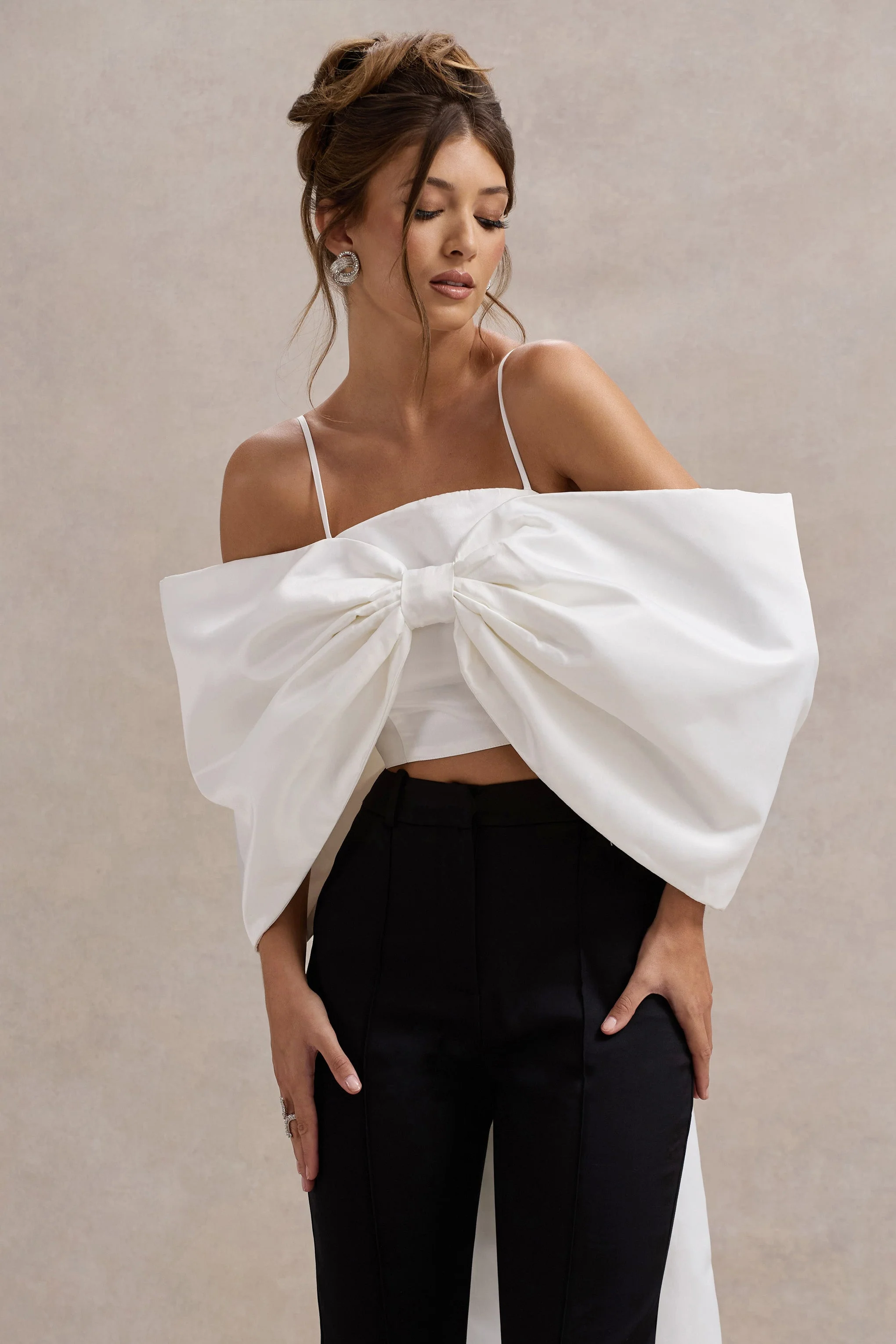 21075-souvenir-white-satin-top-with-oversized-bow-1.webp