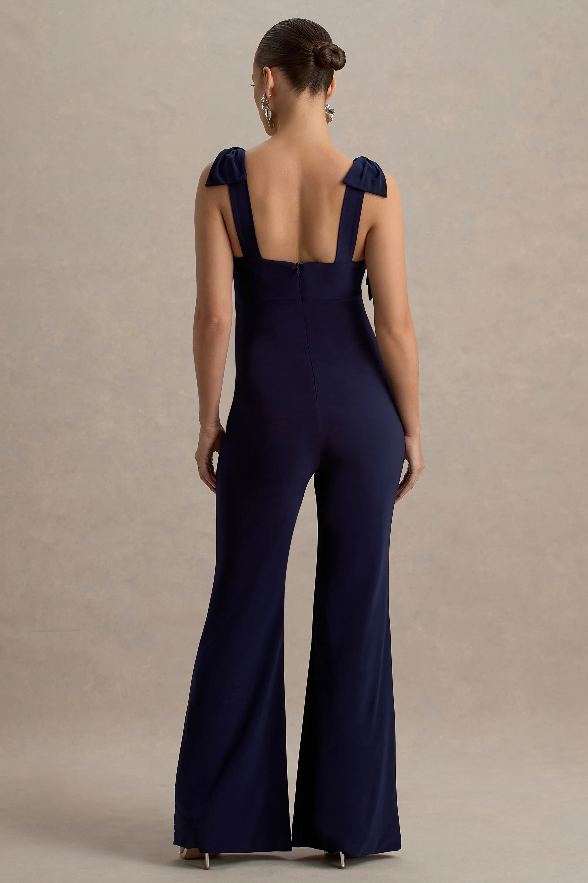 23323-impeccable-navy-sweetheart-bow-strap-maternity-jumpsuit-1.webp