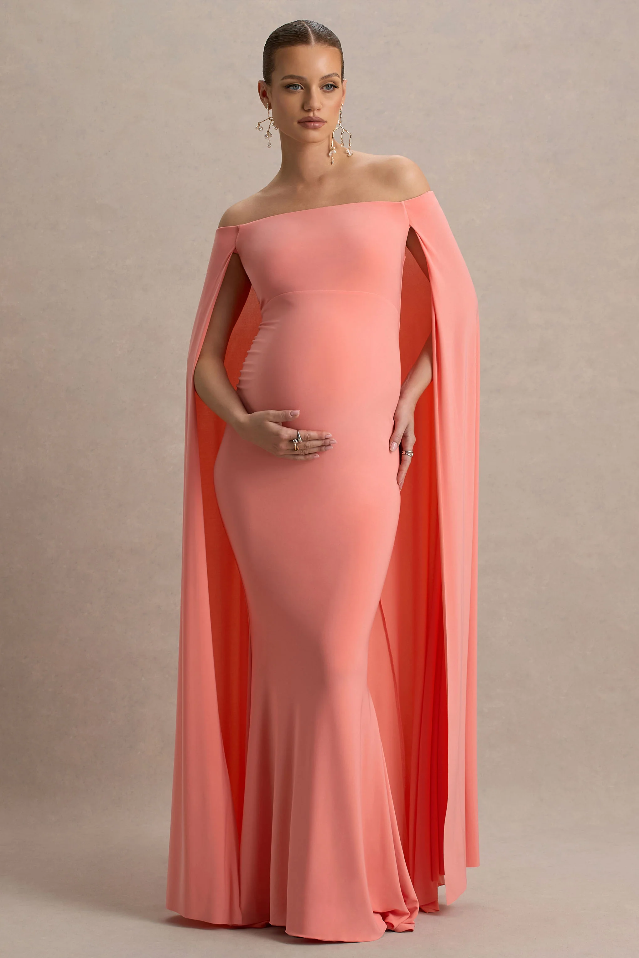 23353-radiance-coral-bardot-maternity-maxi-dress-with-cape-1.webp