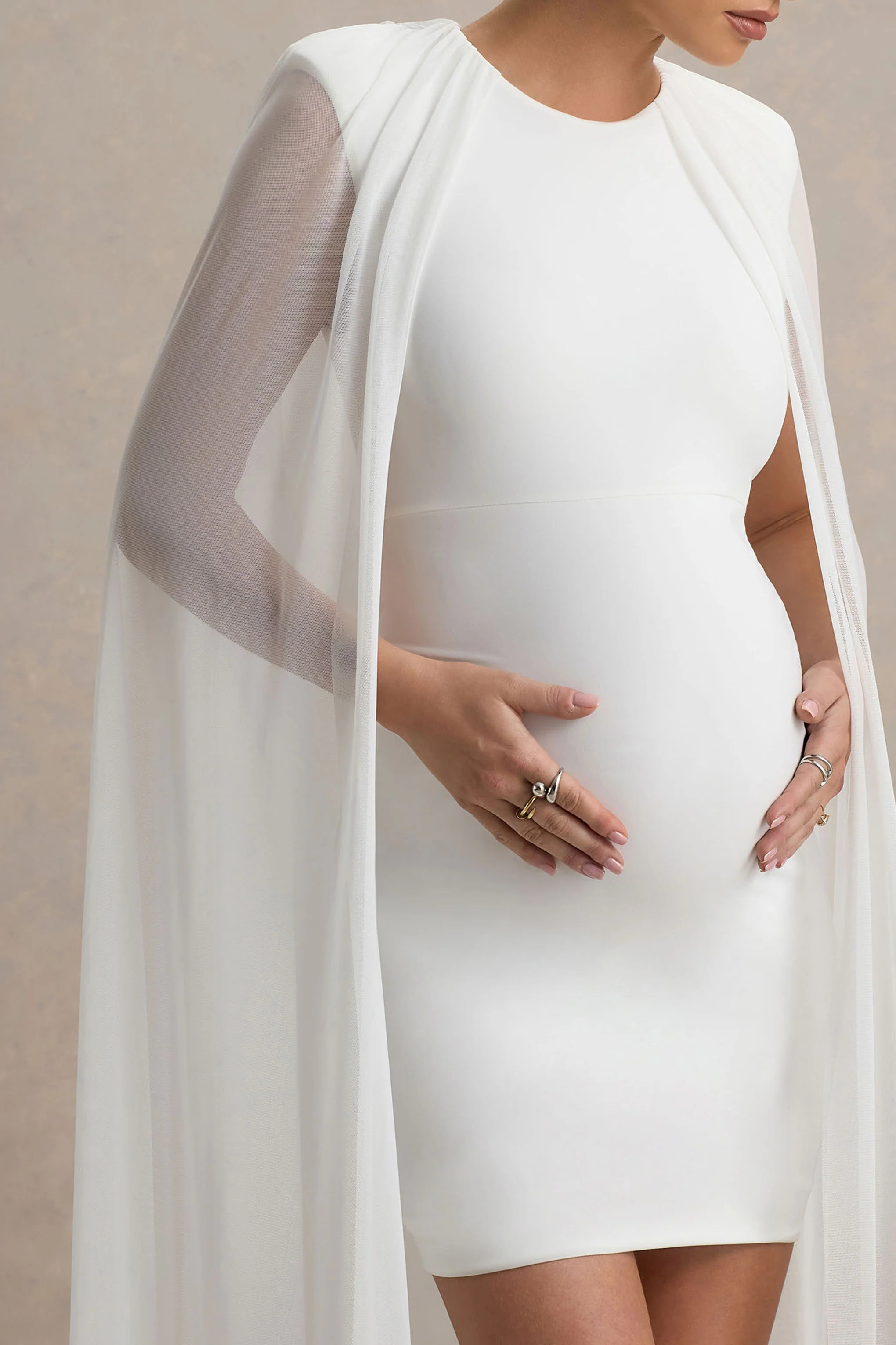 23620-charlene-white-high-neck-maternity-mini-dress-with-mesh-cape-1.webp